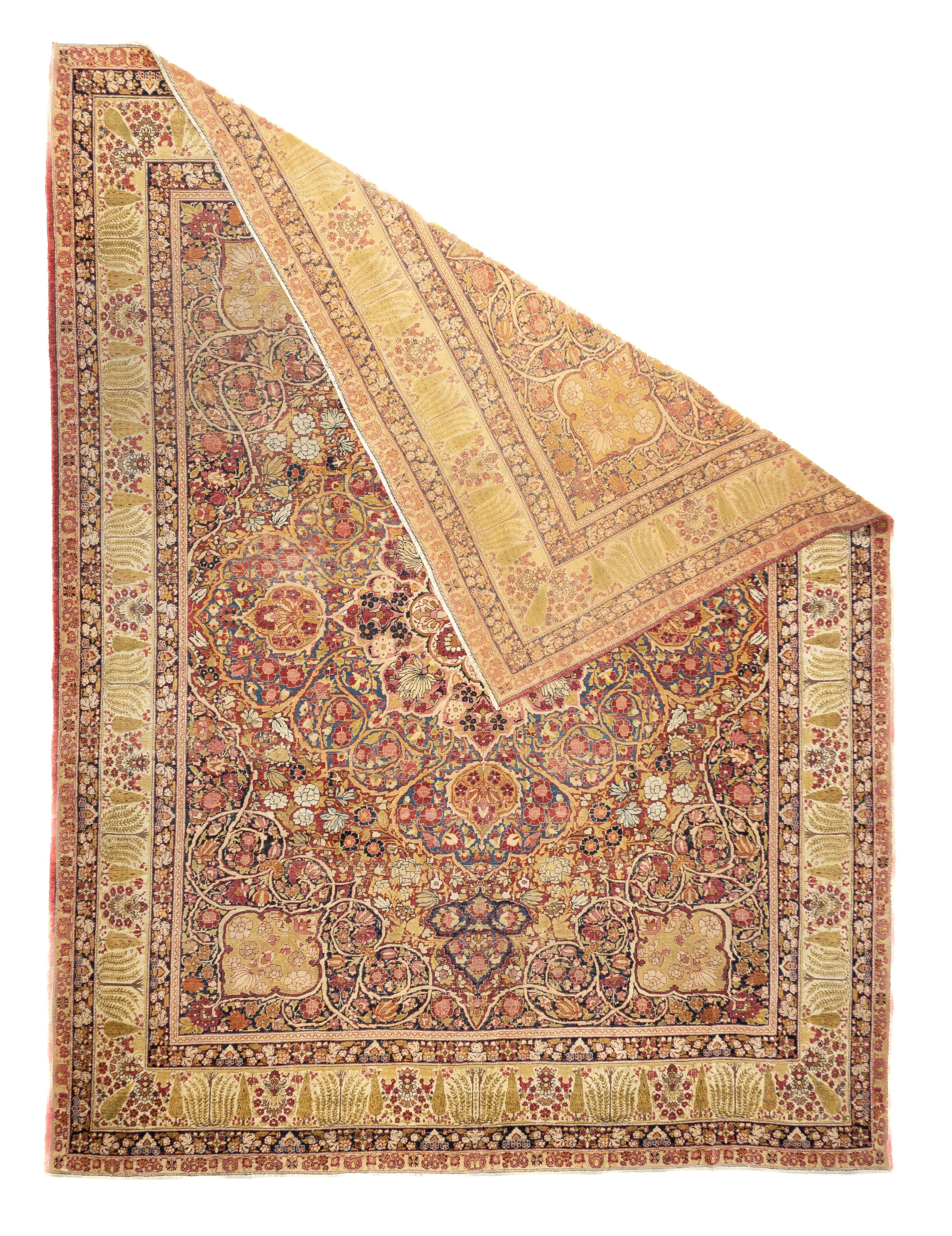 Antiker Lavar Kerman Teppich 8'9'' x 11'9''. Das kochenille-rote Feld beherbergt kräftige, spiralförmige Weinrebenecken und zeigt ein saphirblaues Medaillon mit mehr Volutenrand. Zentrales elfenbeinfarbenes Oktofolienmedaillon mit strahlenförmig