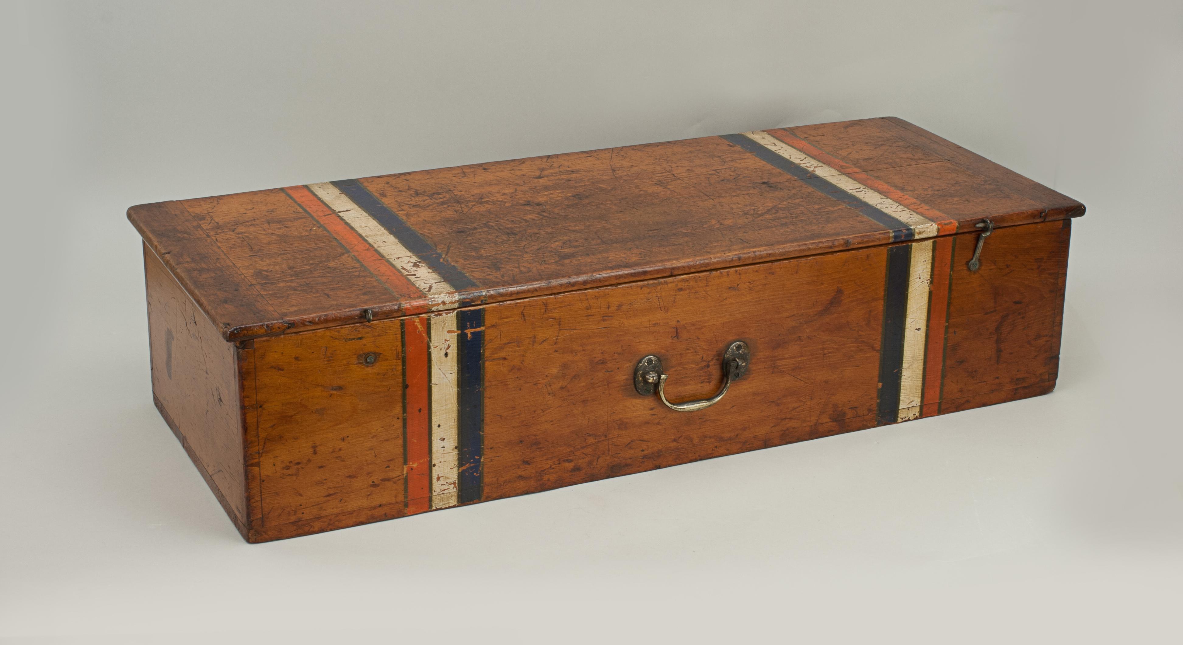 Army and Navy lawn tennis box.
A very rare 'Army & Navy Lawn Tennis' box. The polished pine equipment box, now empty, is painted with coloured stripes on the outside of the box, the interior of the lid having three lithograph labels applied to it.