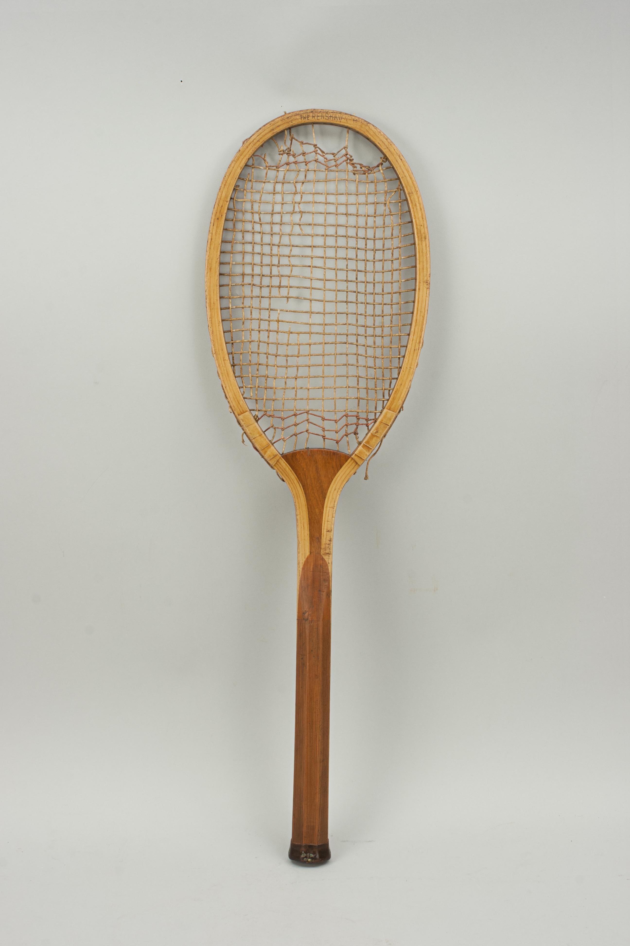 Early wooden lawn tennis racket, the Renshaw.
A Fine example of a long shaped head wooden framed lawn tennis racket. A nice ash framed racket with convex wedge. The walnut wedge is embossed 'The Renshaw' as is the top of the frame. It is known that
