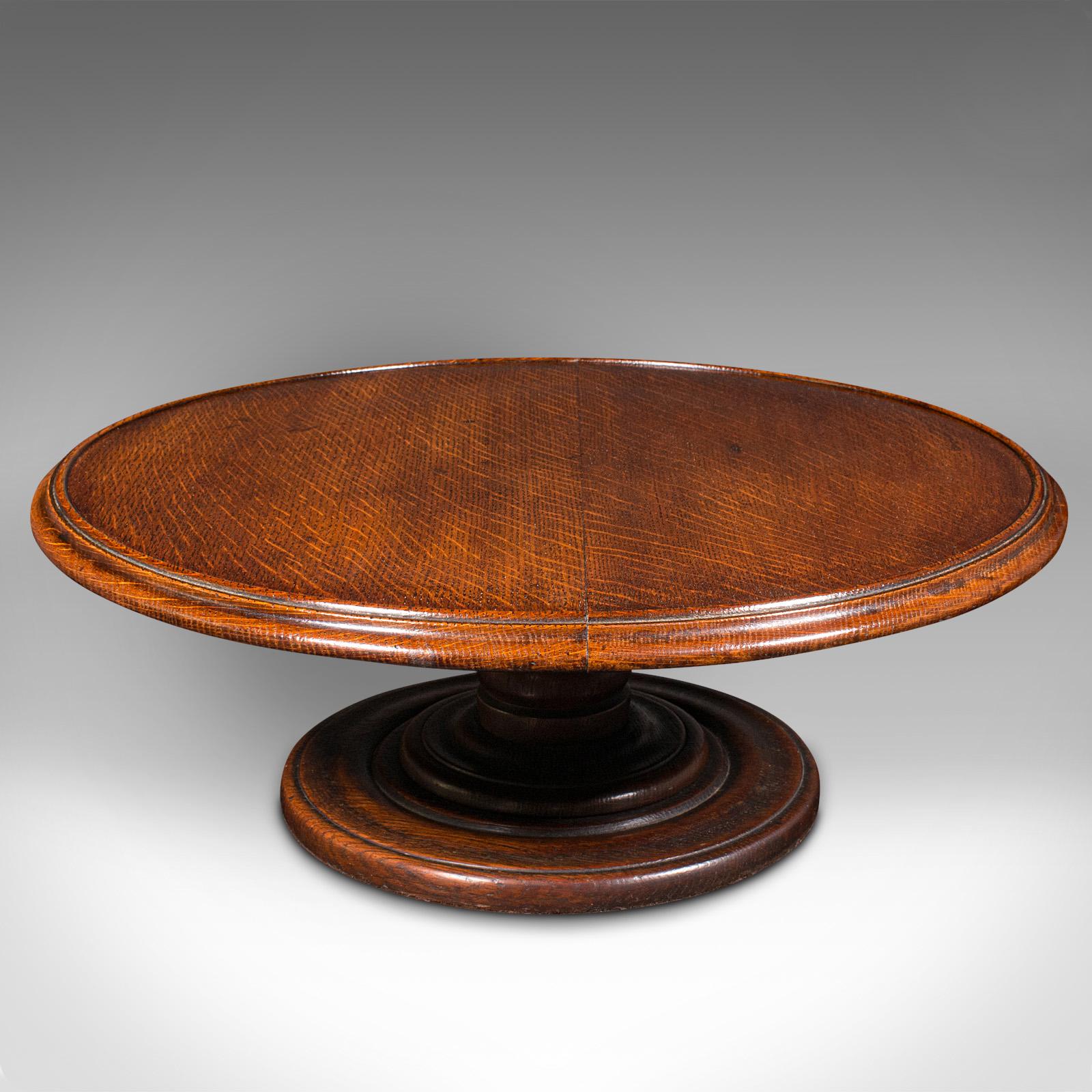 This is an antique Lazy Susan. An English, oak rotary display turntable, dating to the Regency period, circa 1830.

Superb figuring accentuates this generously wide Lazy Susan
Displays a desirable aged patina and in good order
Select oak stocks