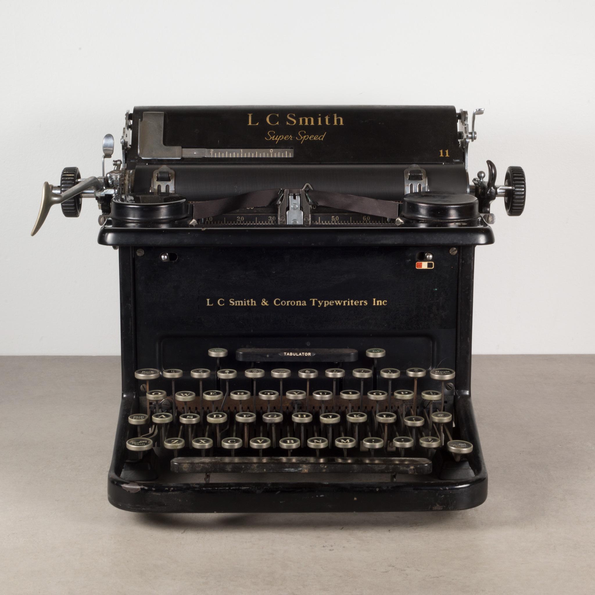 ABOUT

A fully refurbished LC Smith & Corona typewriter in gloss black and original gold lettering. The keys are nickle with black interior and white letters. This typewriter has been refurbished and has smooth typing and functions very well. The