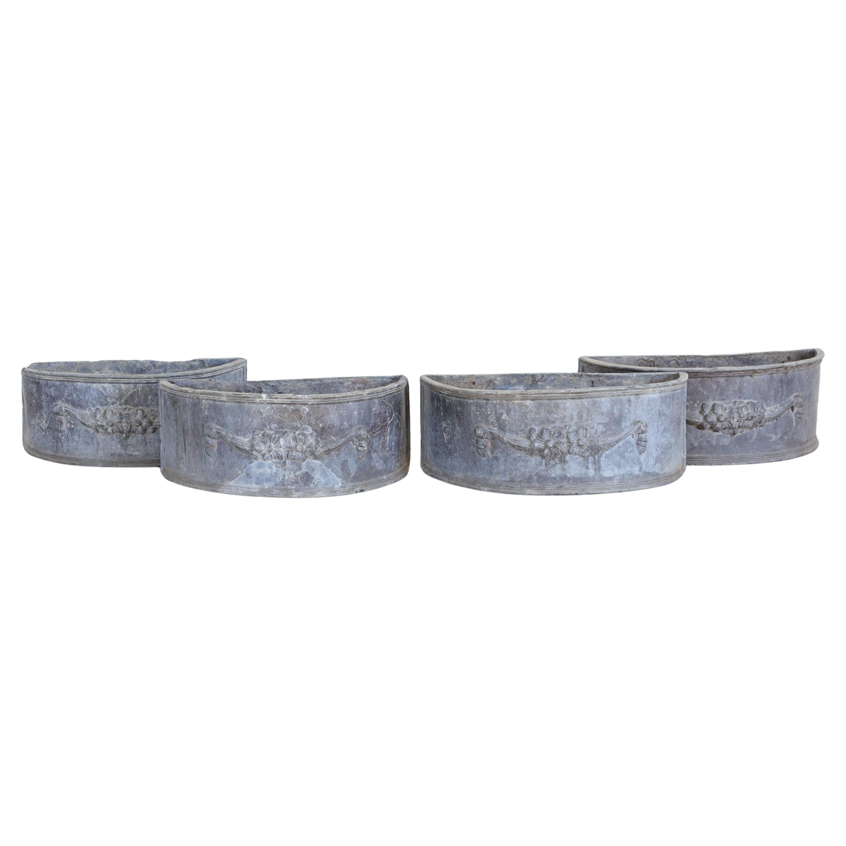 Antique Lead Demilune Planters with Swag Decoration For Sale