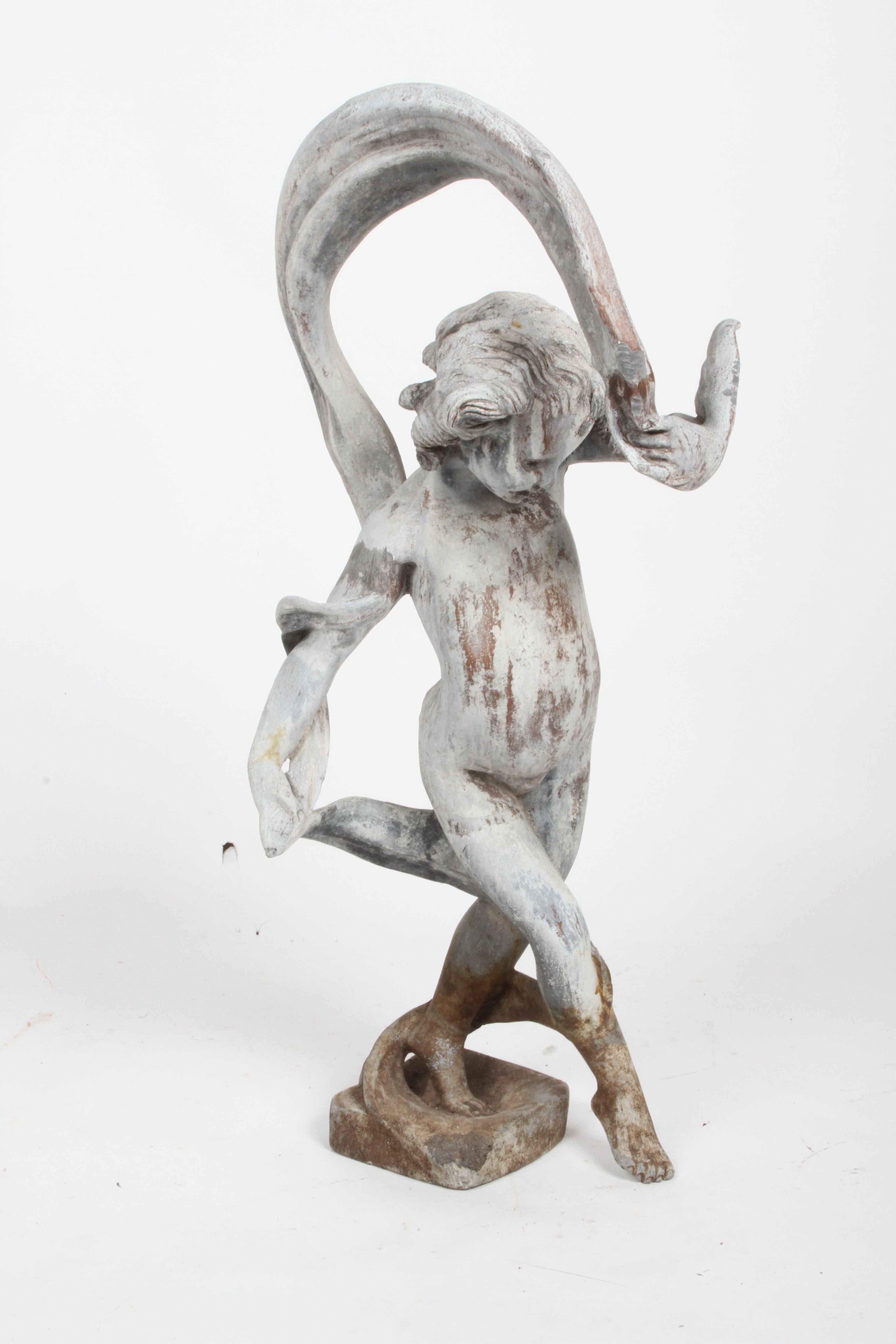 Rarely seen large antique lead garden sculpture of a dancing Putti or Cherub waving a ribbon. Nice patina to lead, some dirt or soil marks to base, few chew marks from critters and a slight opening on rear of leg. Overall shows very well, expected