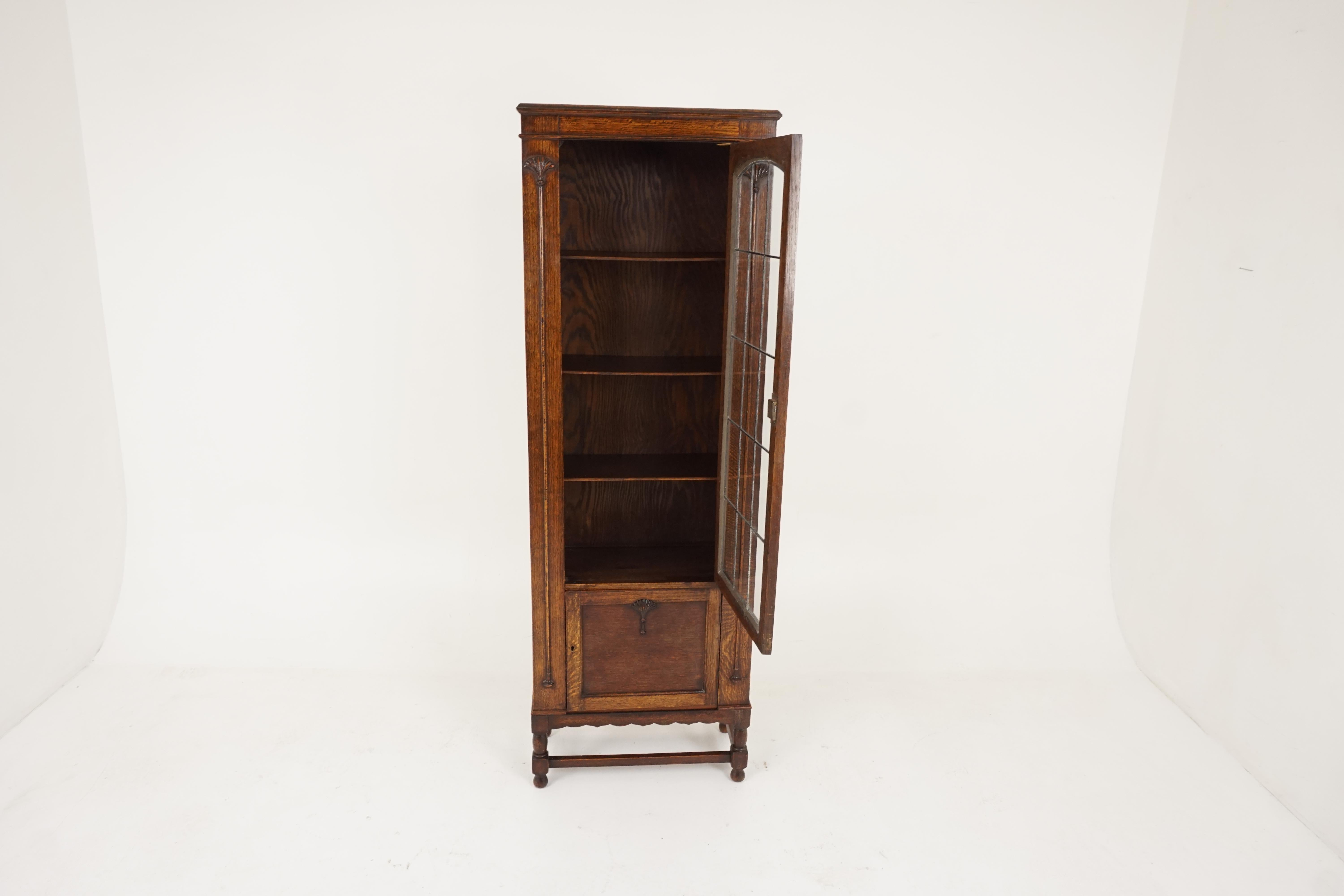 Antique leaded glass bookcase, tiger oak display cabinet, Scotland 1920, B2175

Scotland, 1920
Solid oak
Original finish
Rectangular top
Single leaded glass doors
Opens to reveal three adjustable wooden shelves
Carved mouldings on the