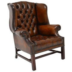 Antique Leather and Mahogany Wing Back Armchair