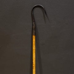 Hameçon de pêche antique en cuir et acier