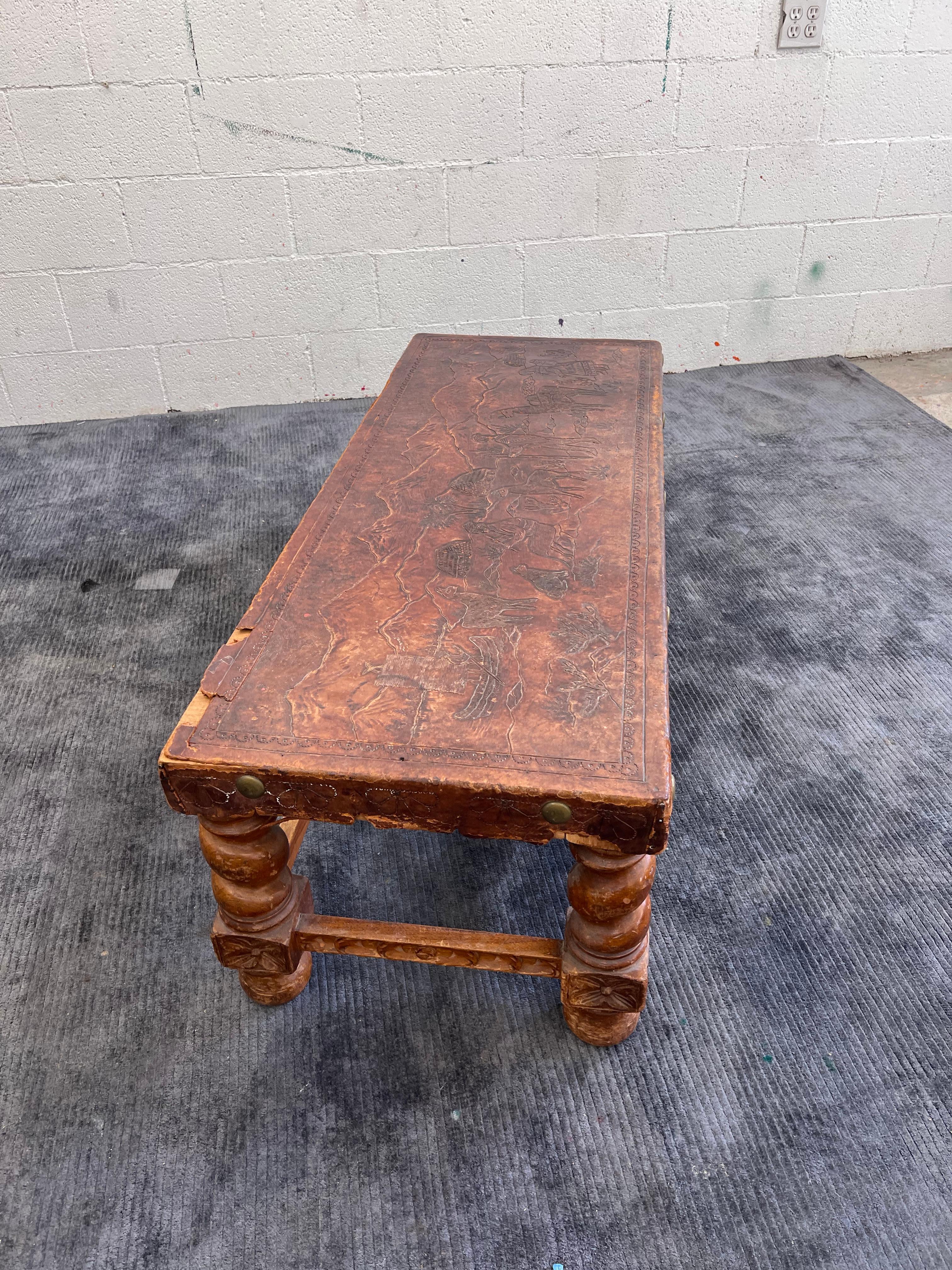Antique leather bound coffee table, Peruvian, Spanish revival In Distressed Condition In Los Angeles, CA
