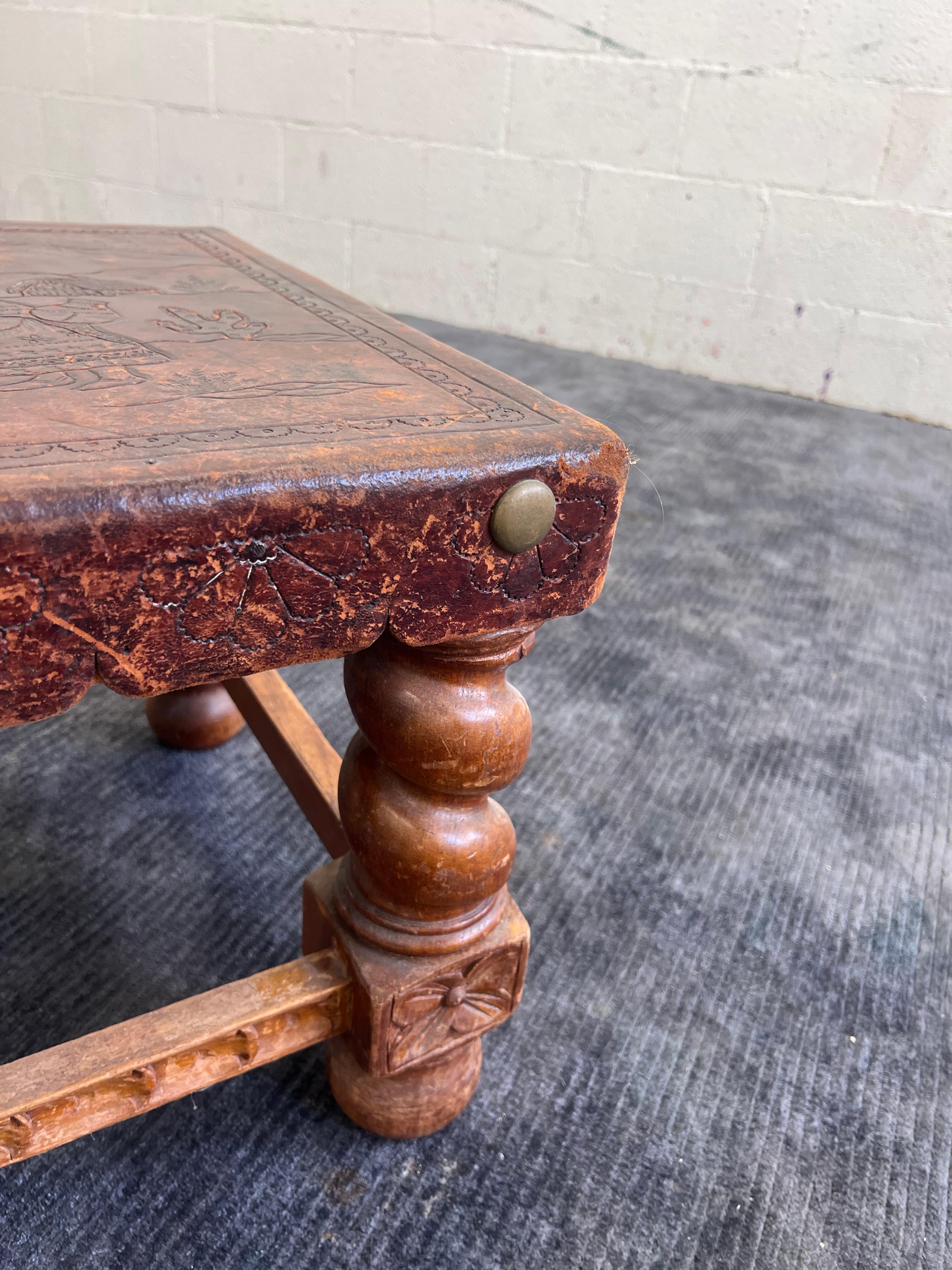 Leather Antique leather bound coffee table, Peruvian, Spanish revival 