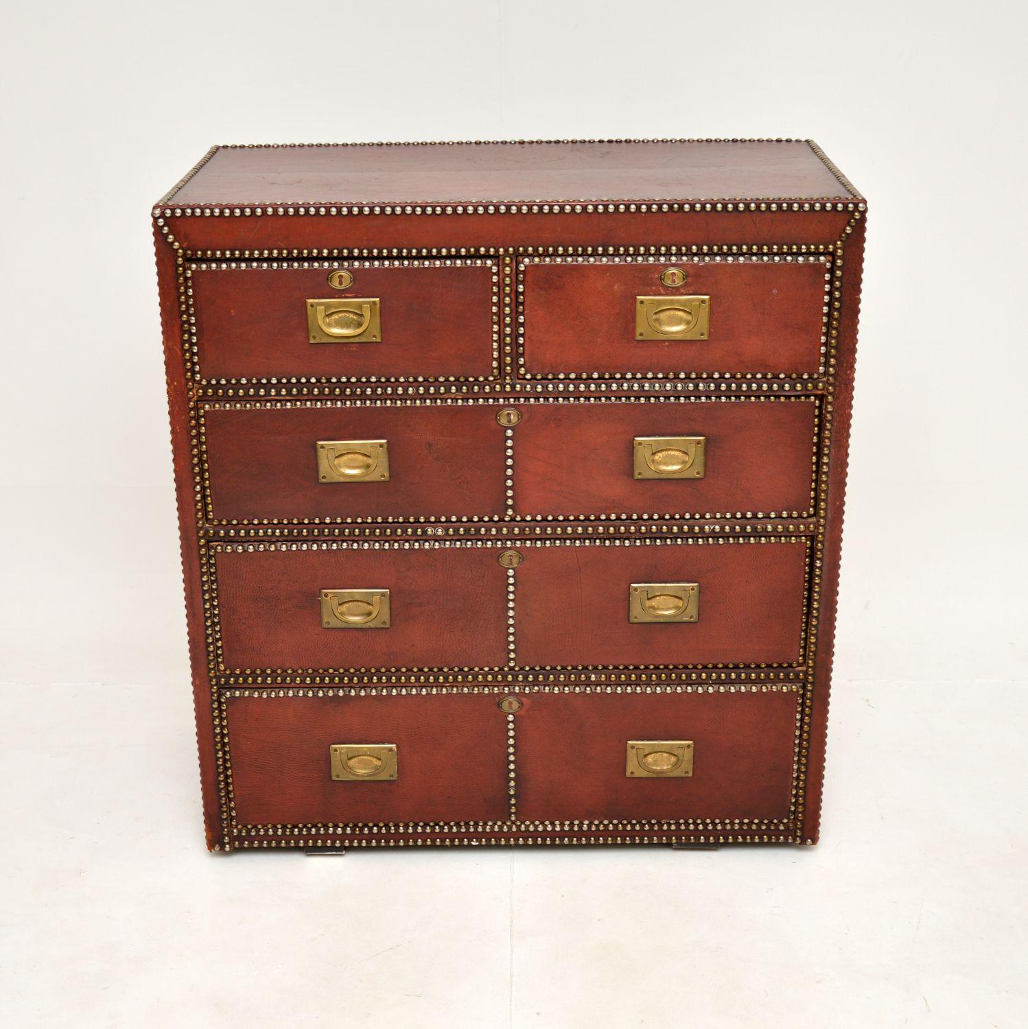 A fantastic antique leather bound military campaign chest of drawers. This was made in England, the chest of drawers itself is Victorian and dates from around the 1890-1900 period.

It has been adapted slightly later, probably some time around the