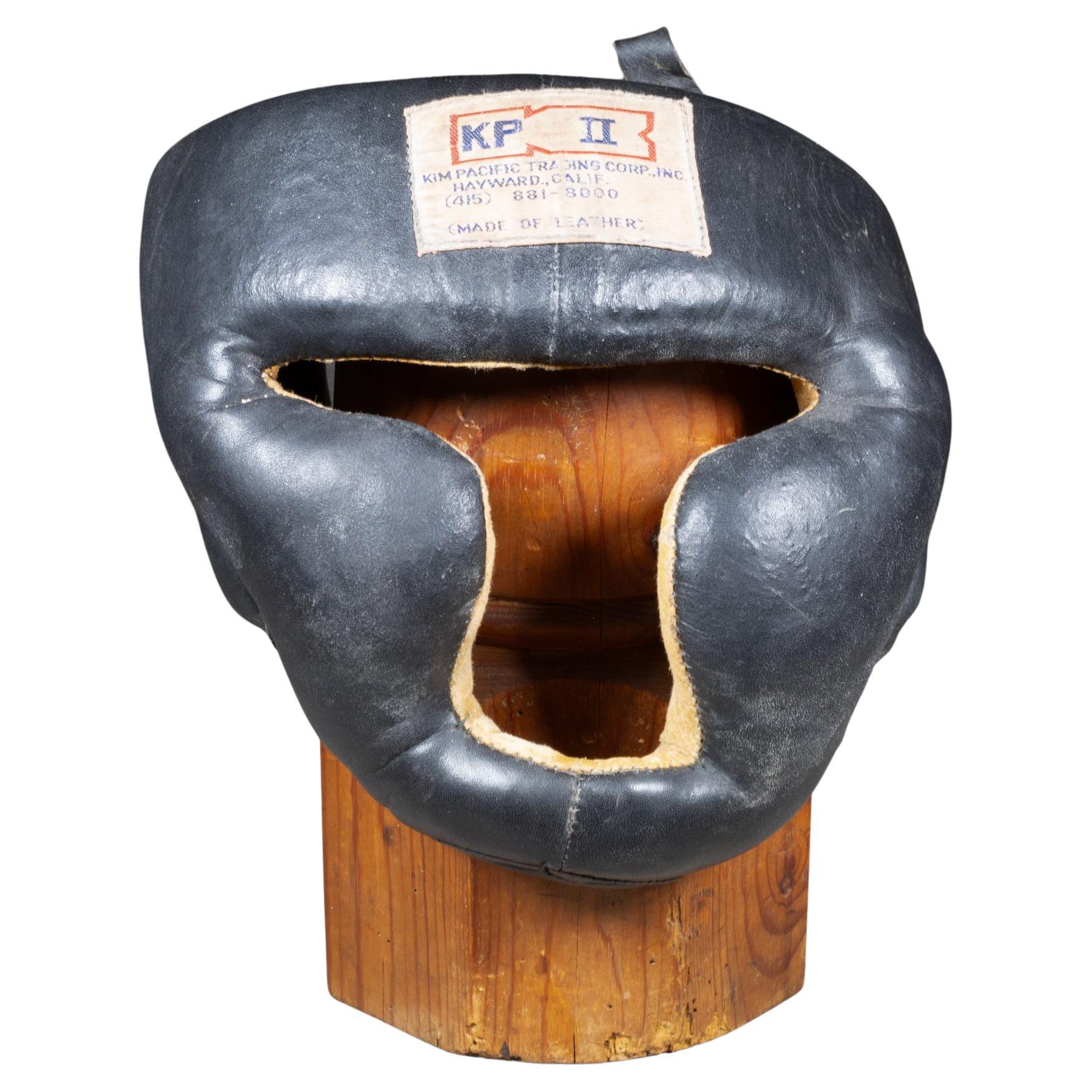 Máscara antigua de cuero para entrenamiento de boxeo c.1940