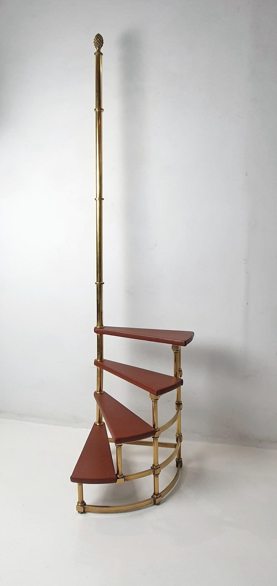 
The 19th-century French library step ladder is an ideal antique to enhance any space. With a semi-circular design and four stairs surrounding a central post, it exudes elegance. This piece has been fully restored and polished. Hand crafted with new