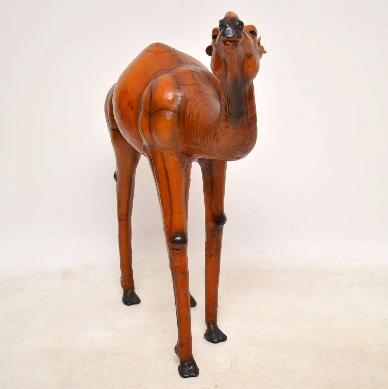 This antique leather camel was probably bought from Liberty of London in the early 20th century. It’s a good size and would have been bought for a children’s room. In fact a child could easily sit on it, because it’s very sturdy and in good