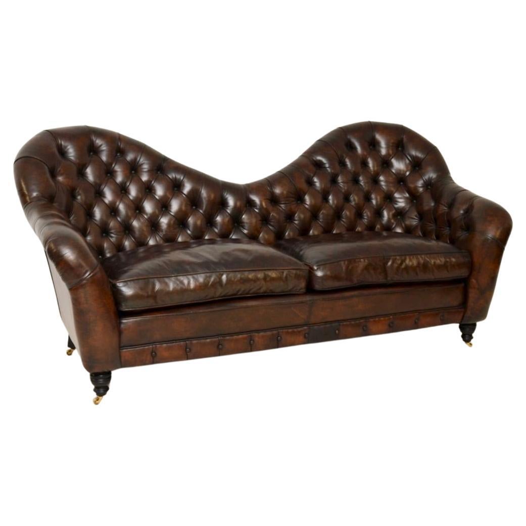 Canapé ancien de style Chesterfield en cuir