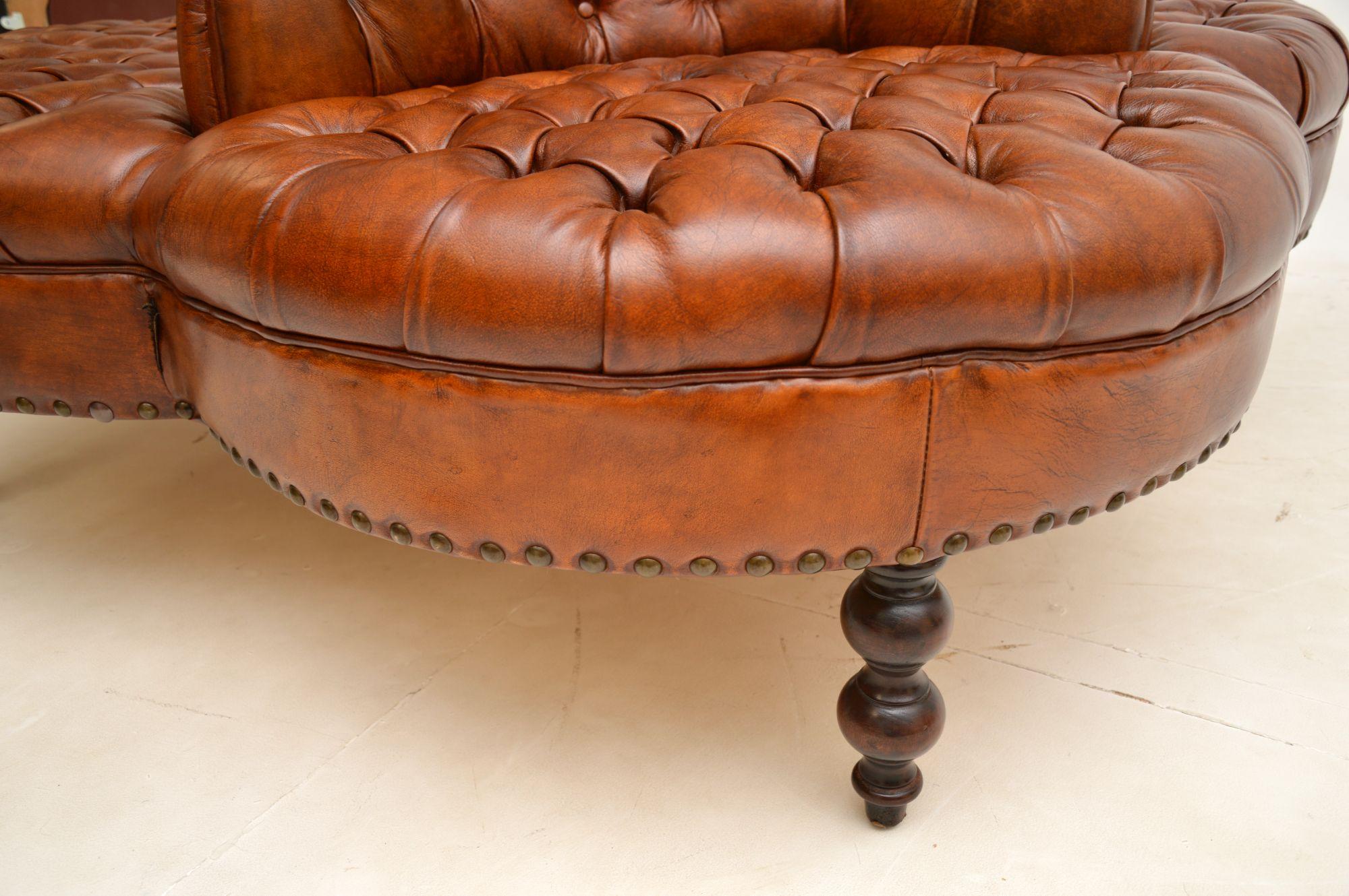 Mid-20th Century Antique Leather Deep Buttoned Conversation Sofa
