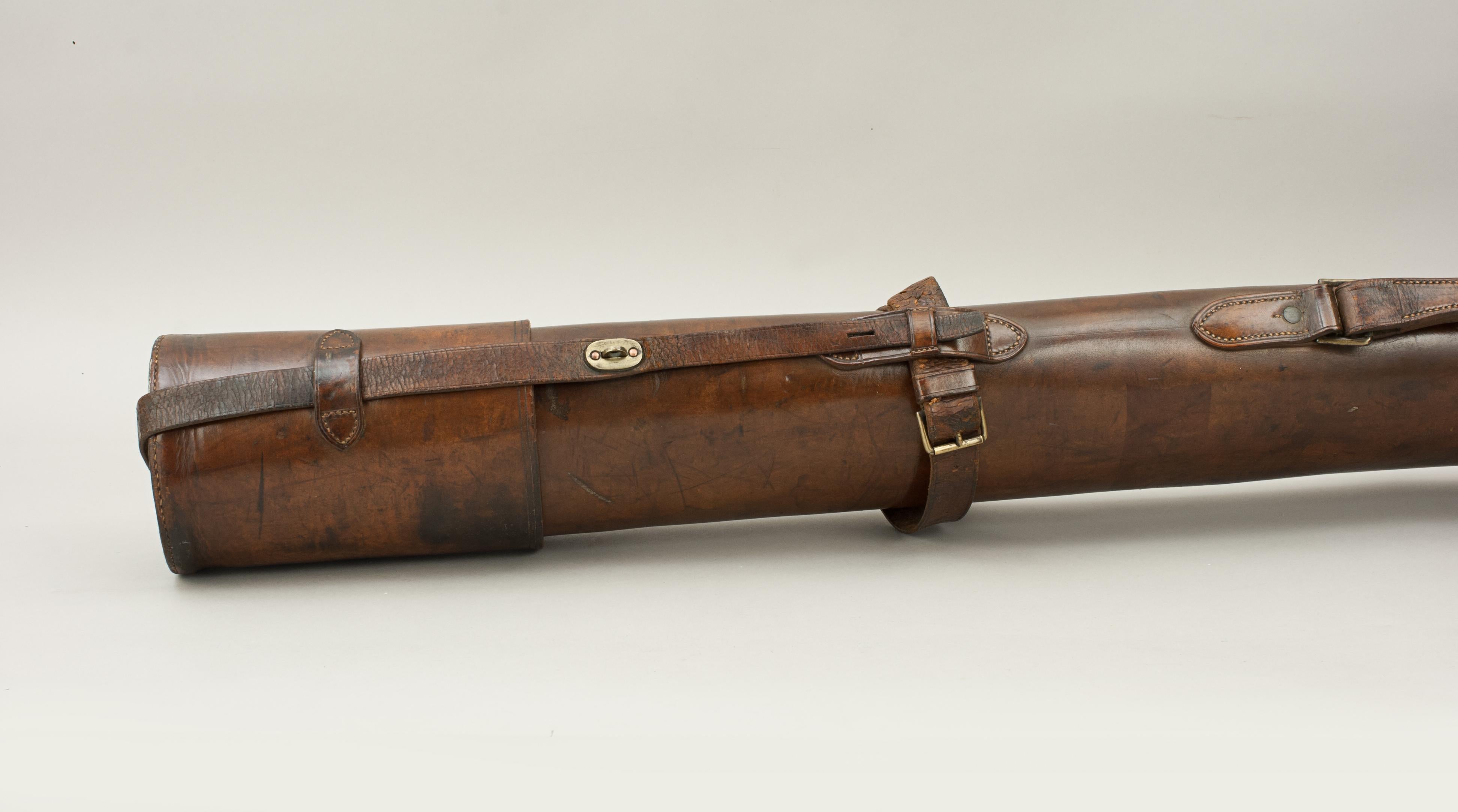 Salmon fishing rod tube. A rare angler 's leather salmon fishing rod tube. The tube is fitted with a removable leather lid with lock strap and brass fittings. It is in good condition with a single strong carry handle. This type of rod tube was used