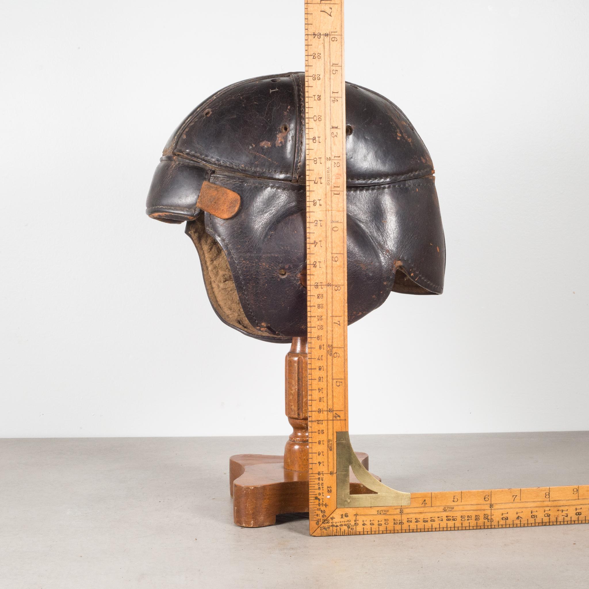 20th Century Antique Leather Football Helmet and Stand, c.1900