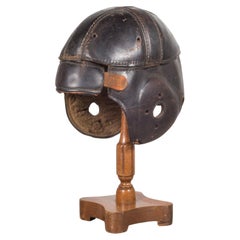 Antique Leather Football Helmet and Stand, c.1900
