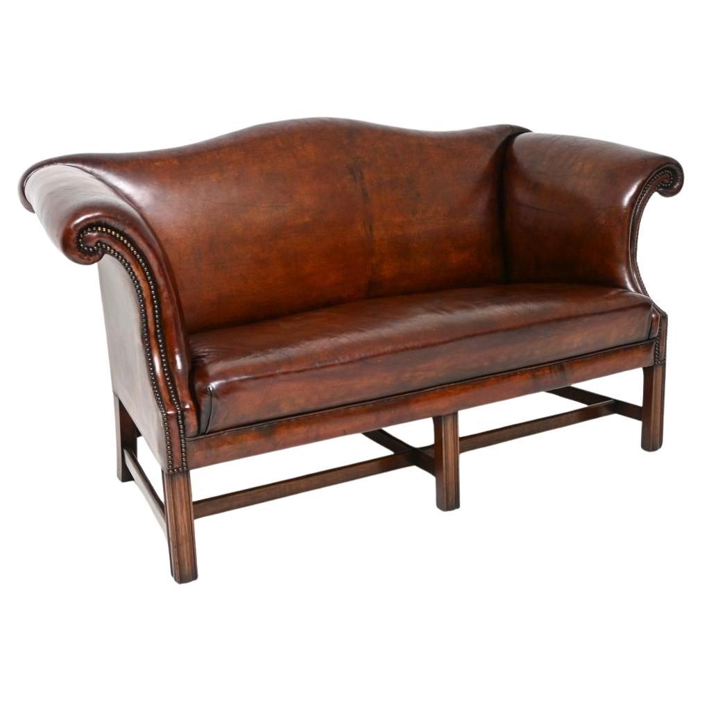 Antique Leather Hump Back Sofa For Sale