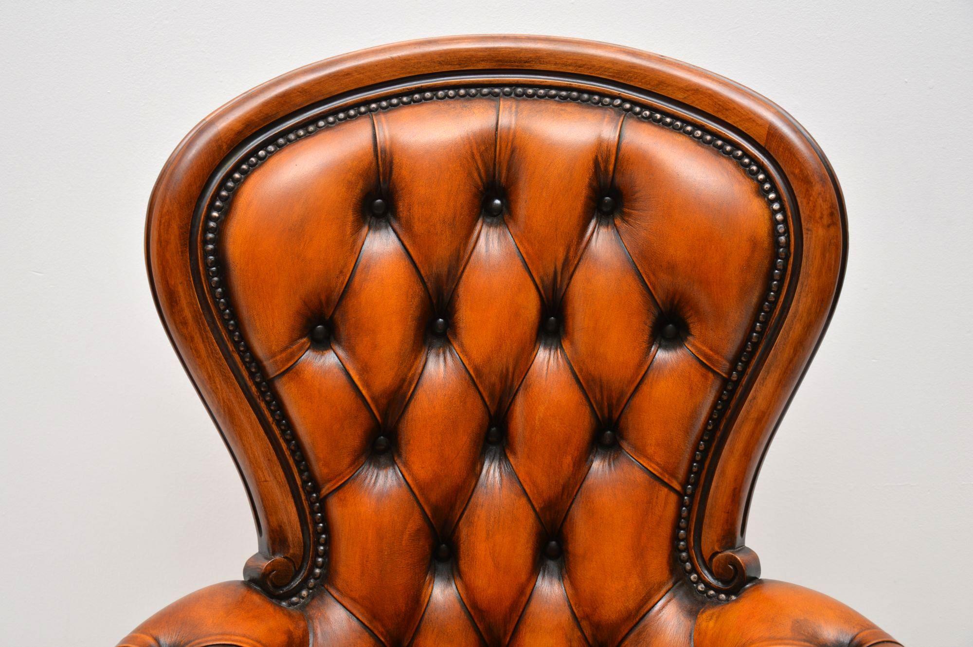 Mid-20th Century Antique Leather and Mahogany Spoon Back Armchair