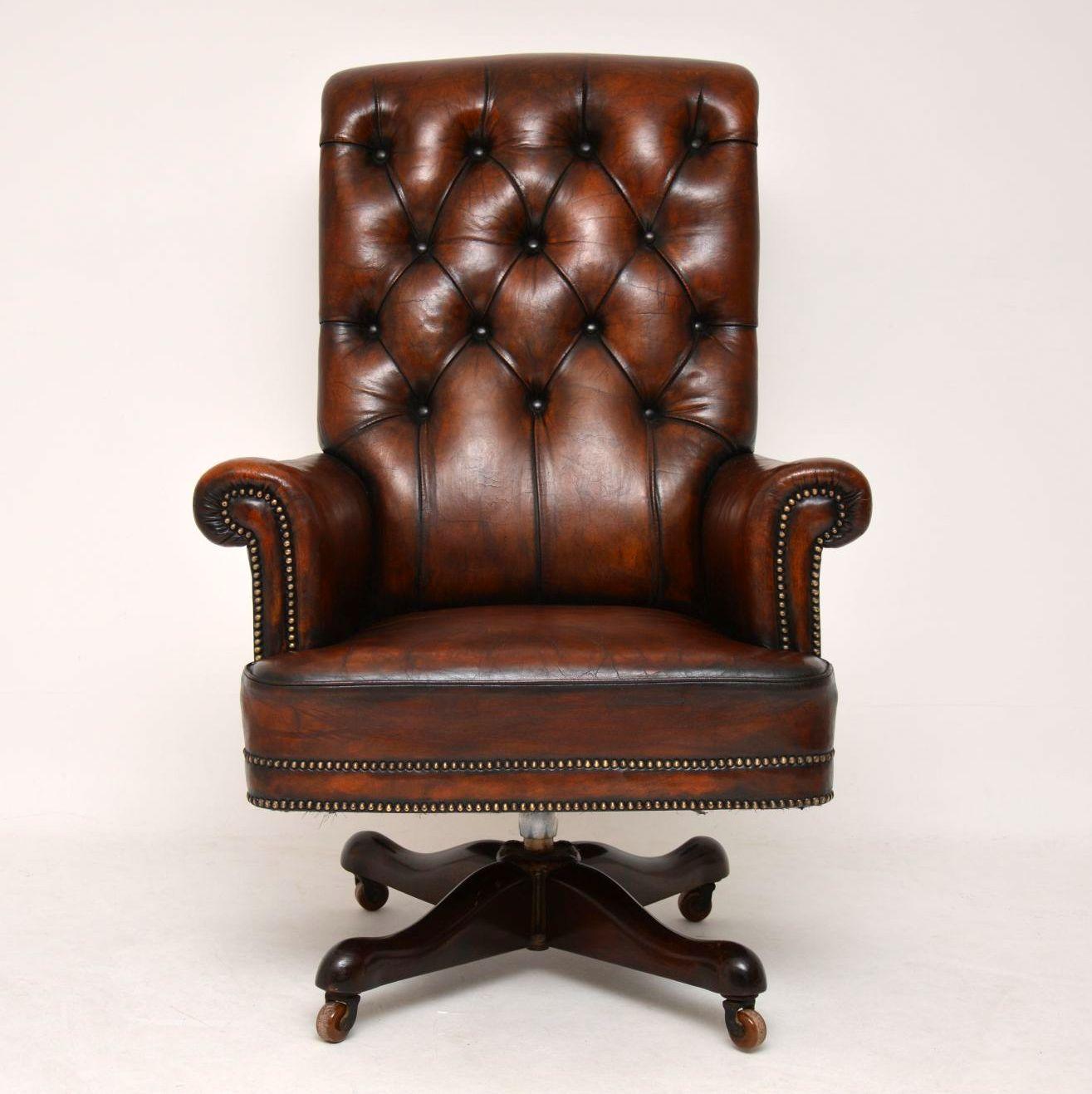 This antique deep buttoned leather swivel armchair is the Rolls Royce of desk chairs and is one of most comfortable chairs I’ve sat on. It’s so comfortable that it could just be used as an armchair without a desk. The height can be adjusted and it