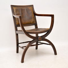 Antique Leather & Mahogany X-Frame Armchair
