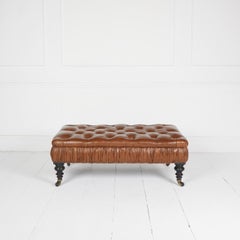 Antique leather ottoman stool