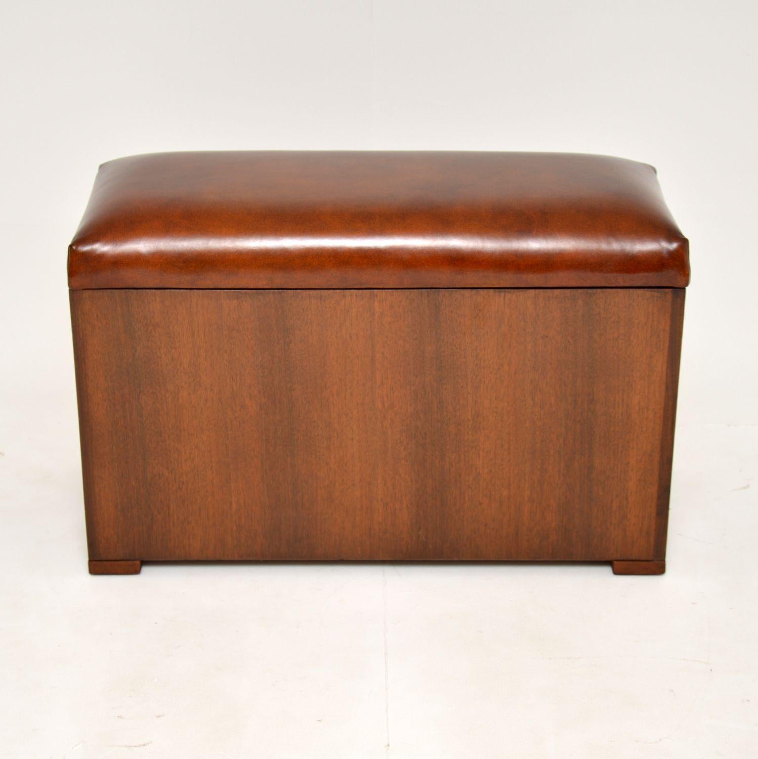 A smart and very useful storage ottoman with a leather top, made in England and dating from around the 1950’s.

It is a great size and is very practical, with plenty of storage & brass inset military handles. This would be perfect as an entry way