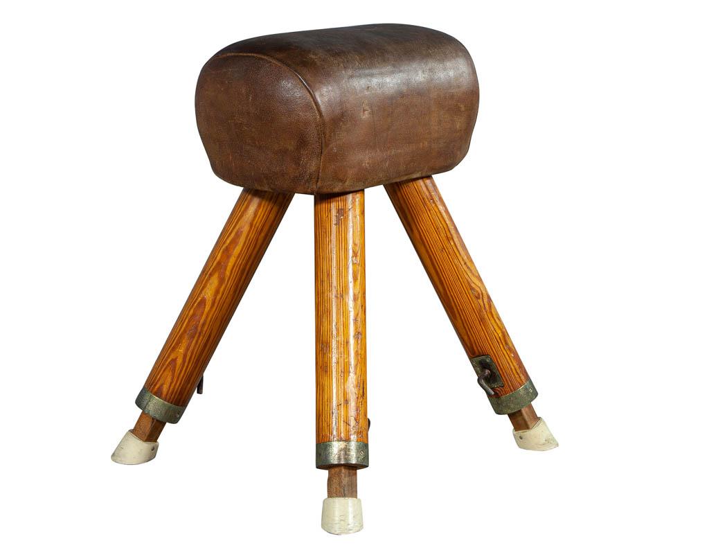 Tall leather pommel horse with wooden legs in original condition. This piece has an awesome distressed patina throughout.

Price includes complimentary curb side delivery to the continental USA.