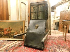 Antique leather sedan Chair, regal black leather and gilded brass, wooden '800