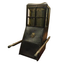 Antique leather sedan Chair, regal black leather and gilded brass, wooden '800