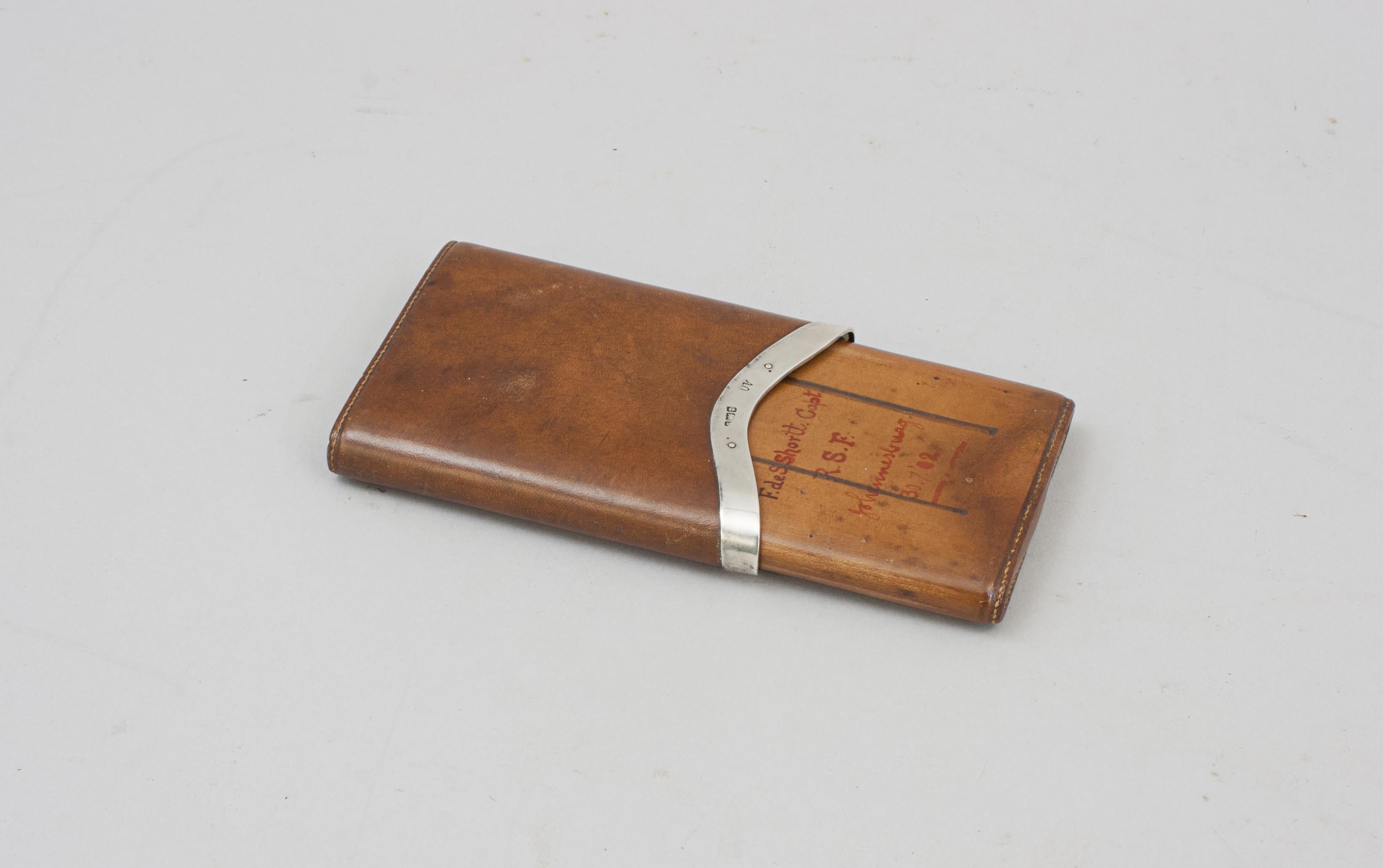 Leather Cigarette Case With Silver Fittings.
A fine leather two-part cigarette case with a good silver mount. The mount is hallmarked, Birmingham 1901, with makers initials AO, probably Adolphe Oppenheimer & Co. The inner slide has written in red