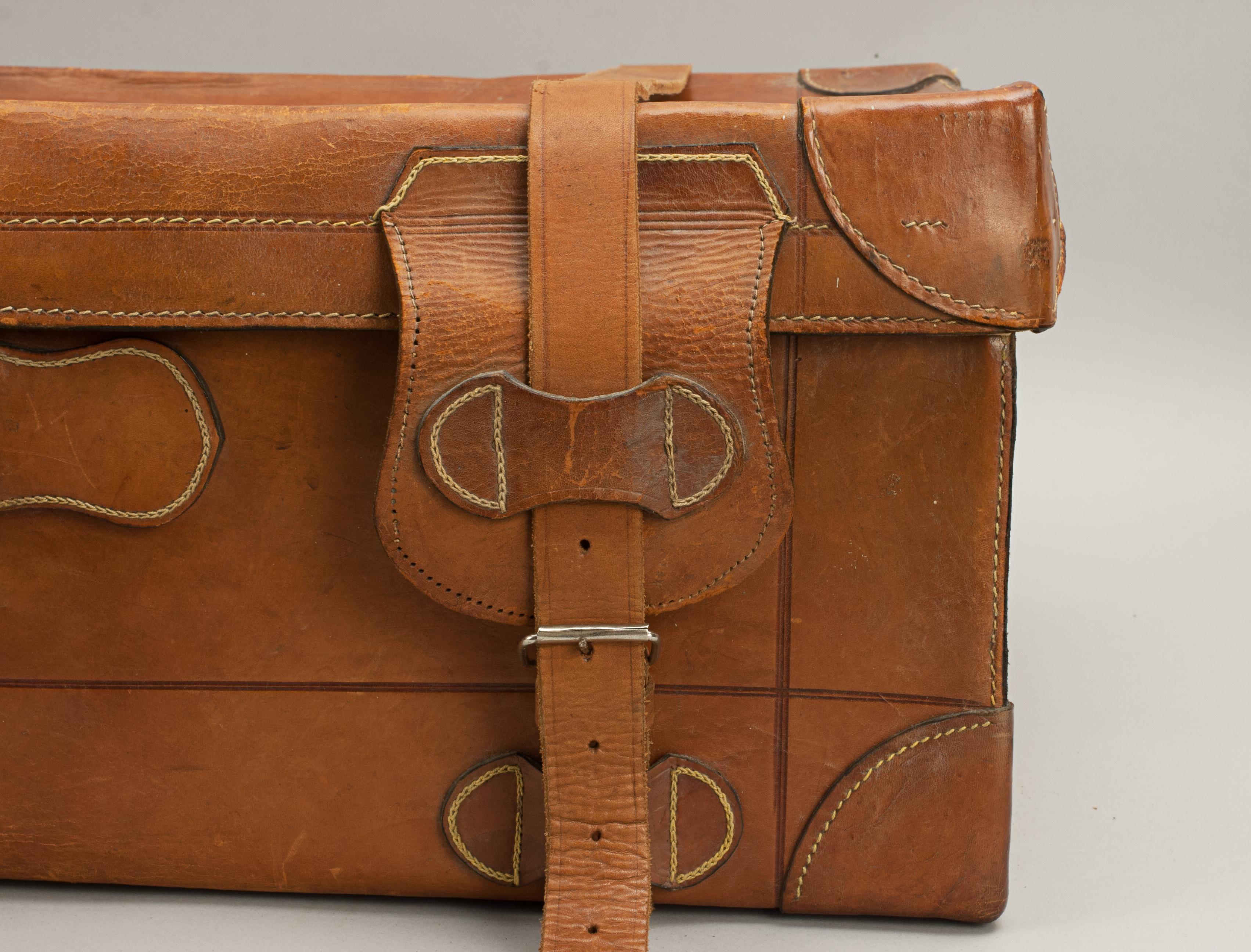 vintage leather suitcase with straps
