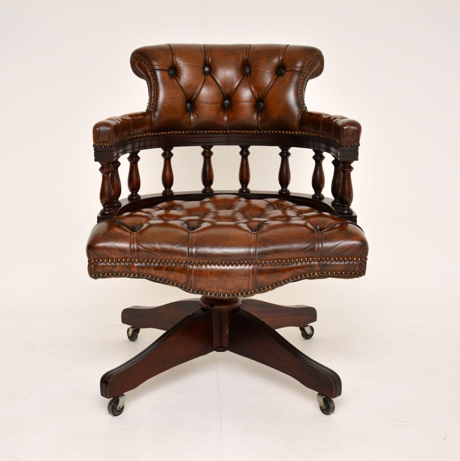 A lovely antique Victorian style leather captains desk chair. This was made in England, it dates from around the 1950-60’s.

It is very well made and comfortable, with beautiful brown deep buttoned leather upholstery. It swivels smoothly on the