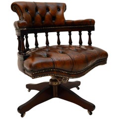 Chaise de bureau pivotante en cuir antique