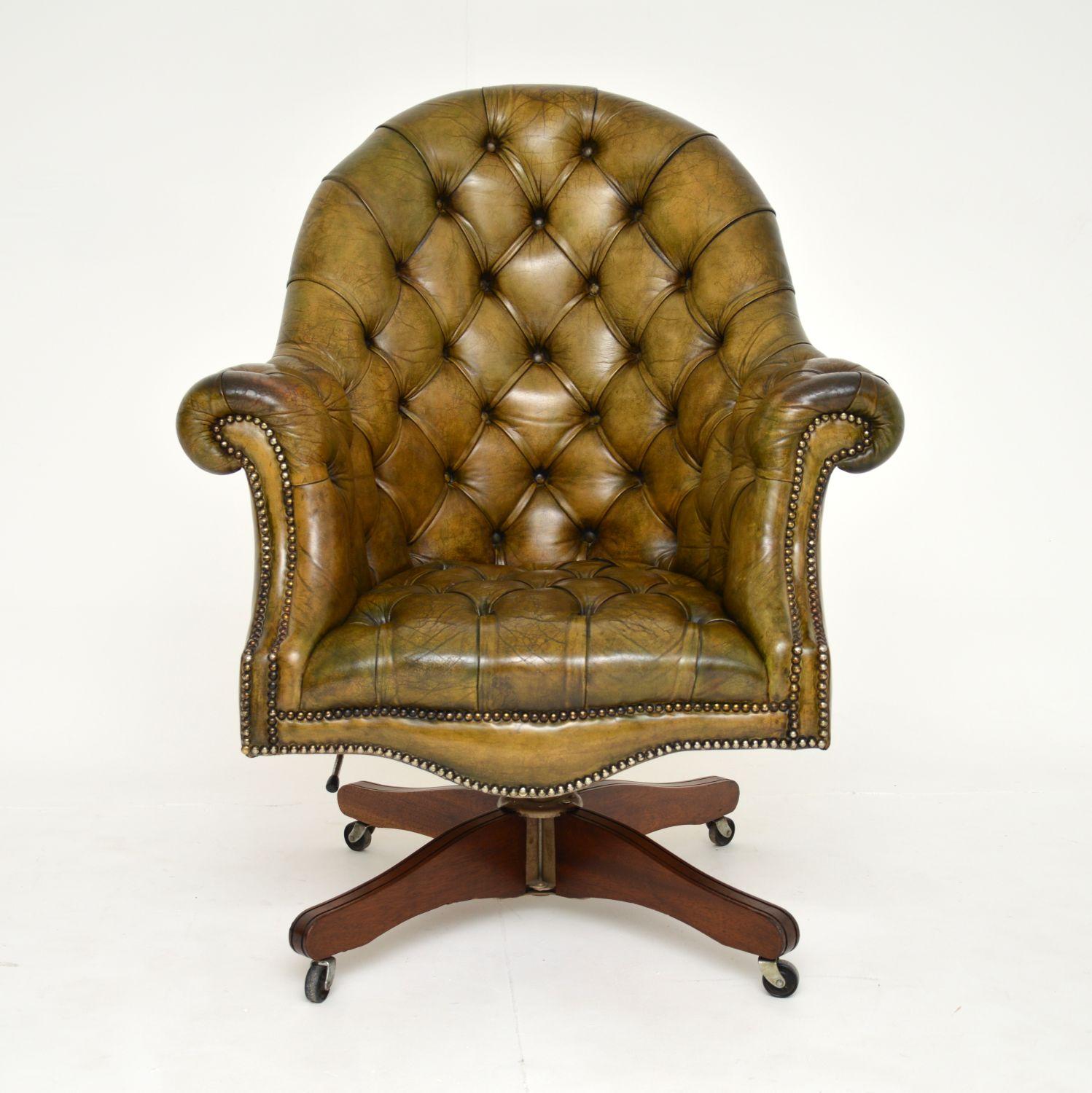 A stunning and extremely comfortable antique deep buttoned leather directors desk chair. This was made in England, it dates from around the 1950’s.

It is of superb quality and has very generous proportions. The leather has a gorgeous colour tone