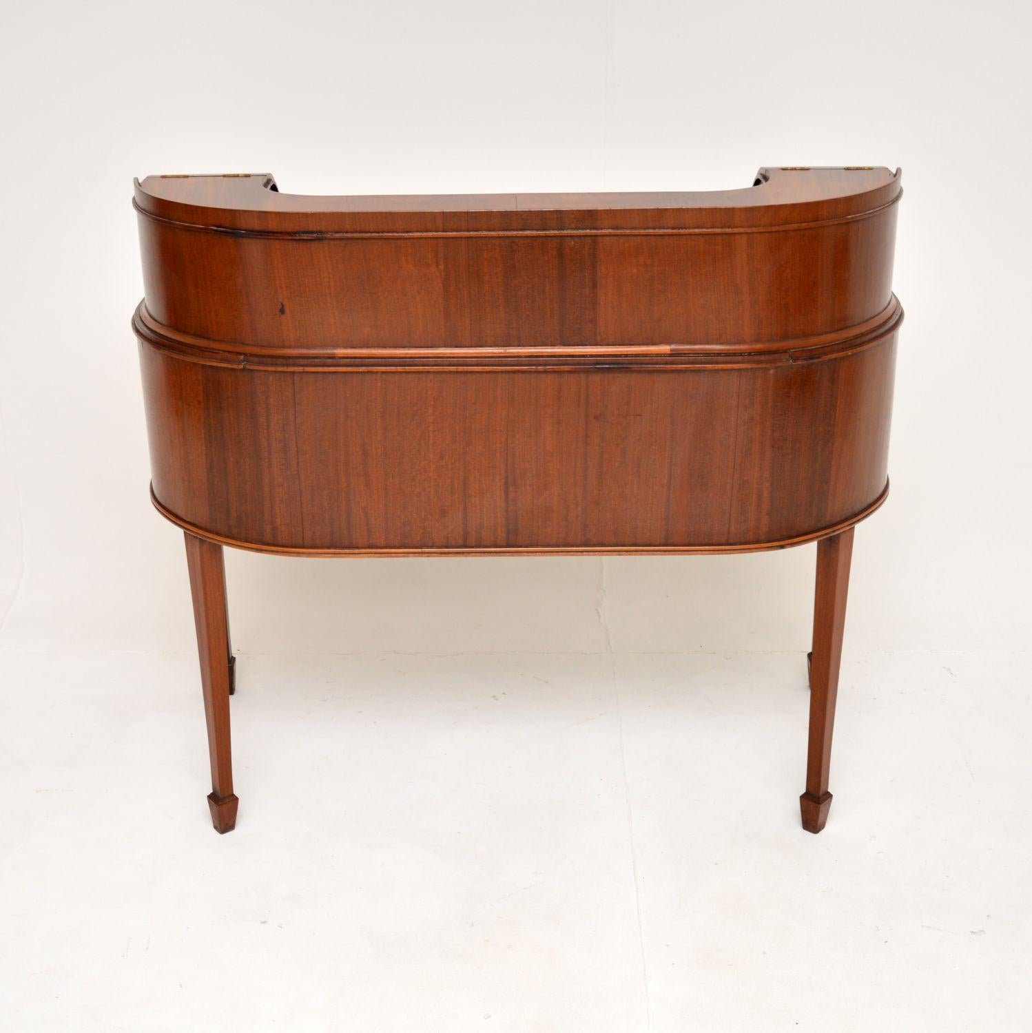 Early 20th Century Antique Leather Top Carlton House Desk