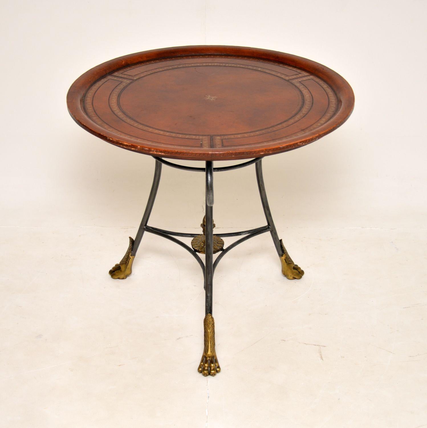 A beautiful and very well made antique gueridon table, made in England and dating from around the 1950’s.

This is of superb quality and it is a useful size. The top is completely leather bound, with a gorgeous colour tone and lovely gold tooling.