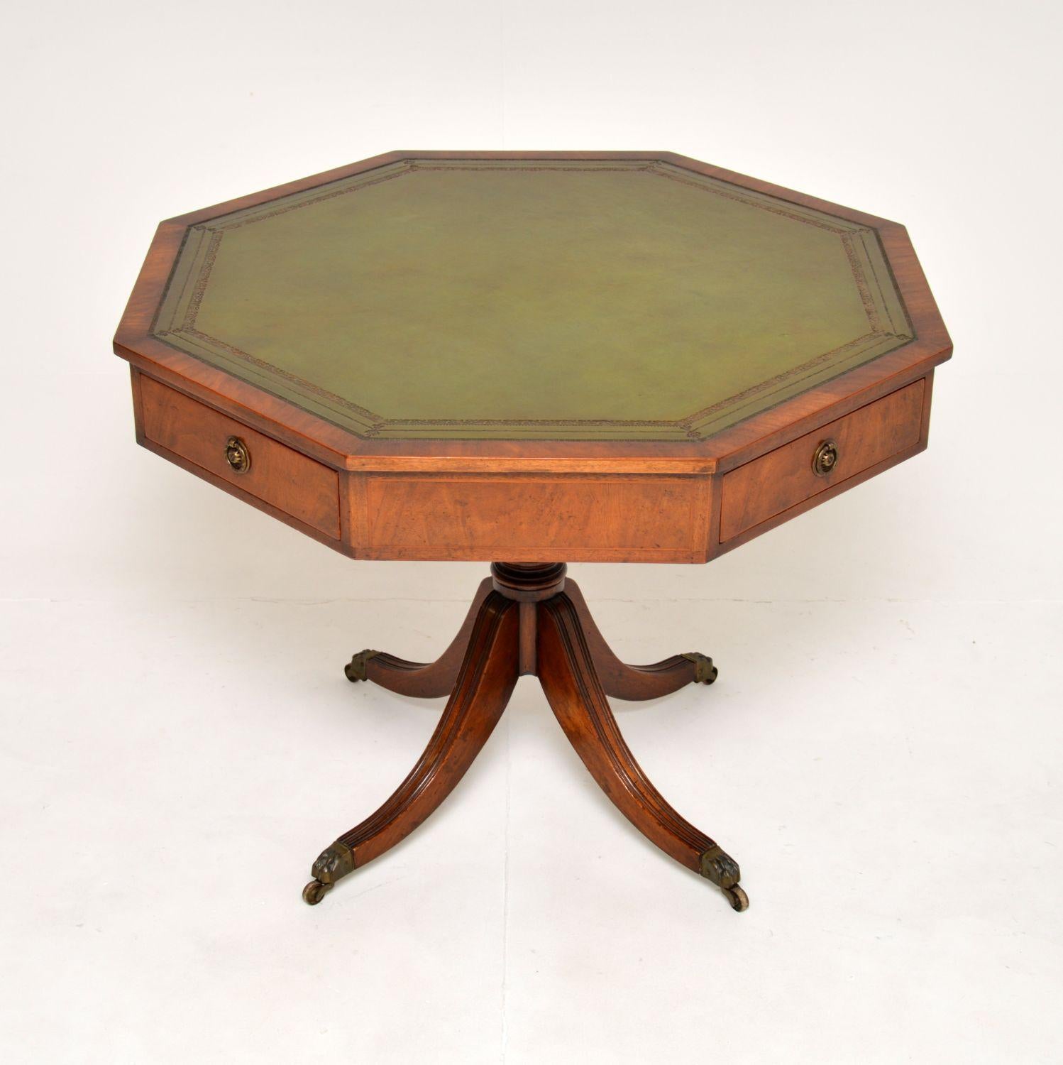 A fantastic antique leather top drum table. This was made in England, it is in the Regency style and dates from around the 1900-1920 period.

It is of fabulous quality and is a very impressive size. The inset leather top has gold tooled edges, this