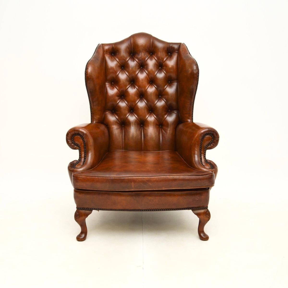 A fantastic antique leather wing back armchair. This was made in England, it dates from around the 1930’s.

The quality is superb and it is extremely comfortable to relax in, it is supportive and well padded. The chestnut leather has a gorgeous