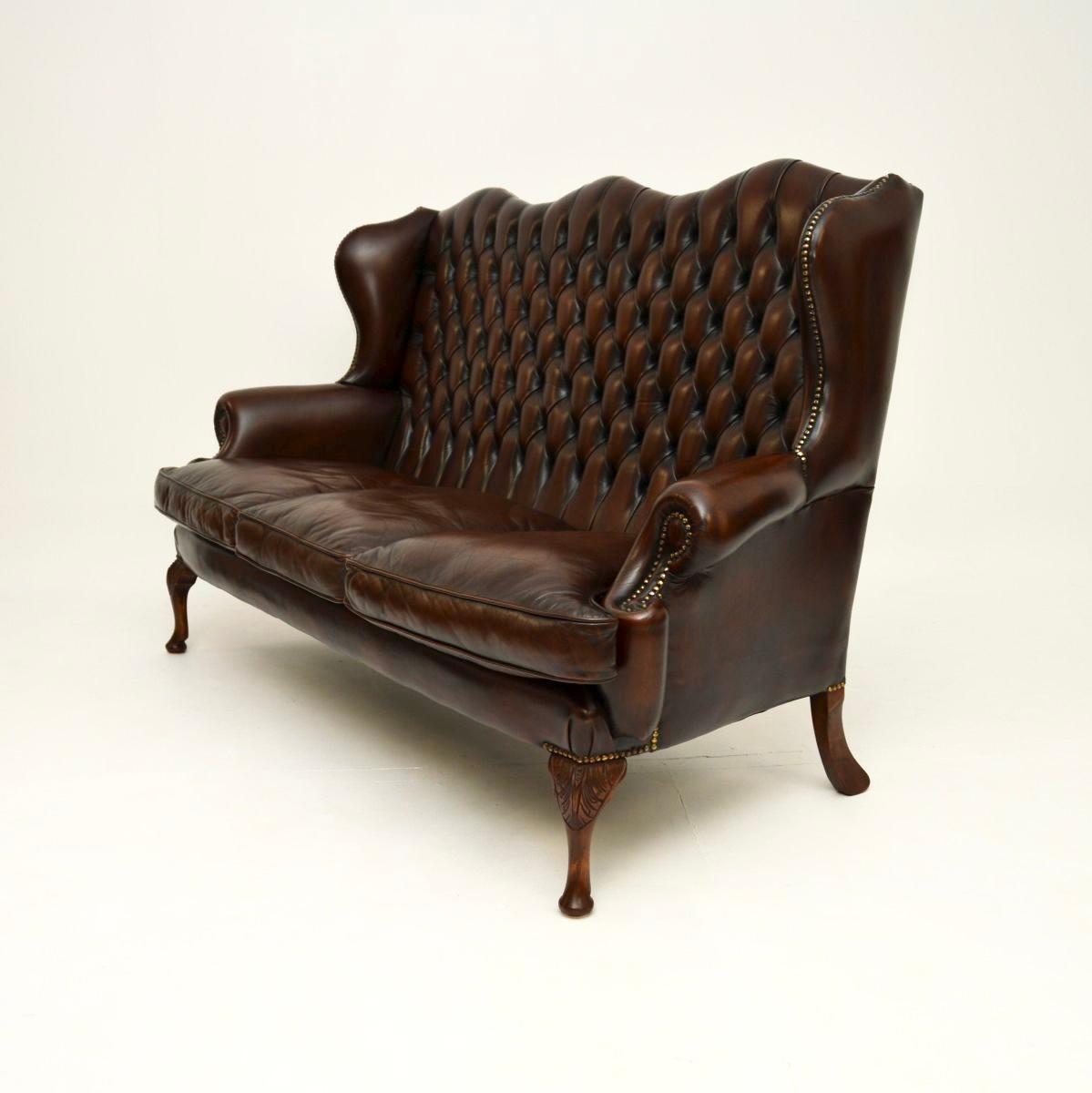 British Antique Leather Wing Back Sofa For Sale