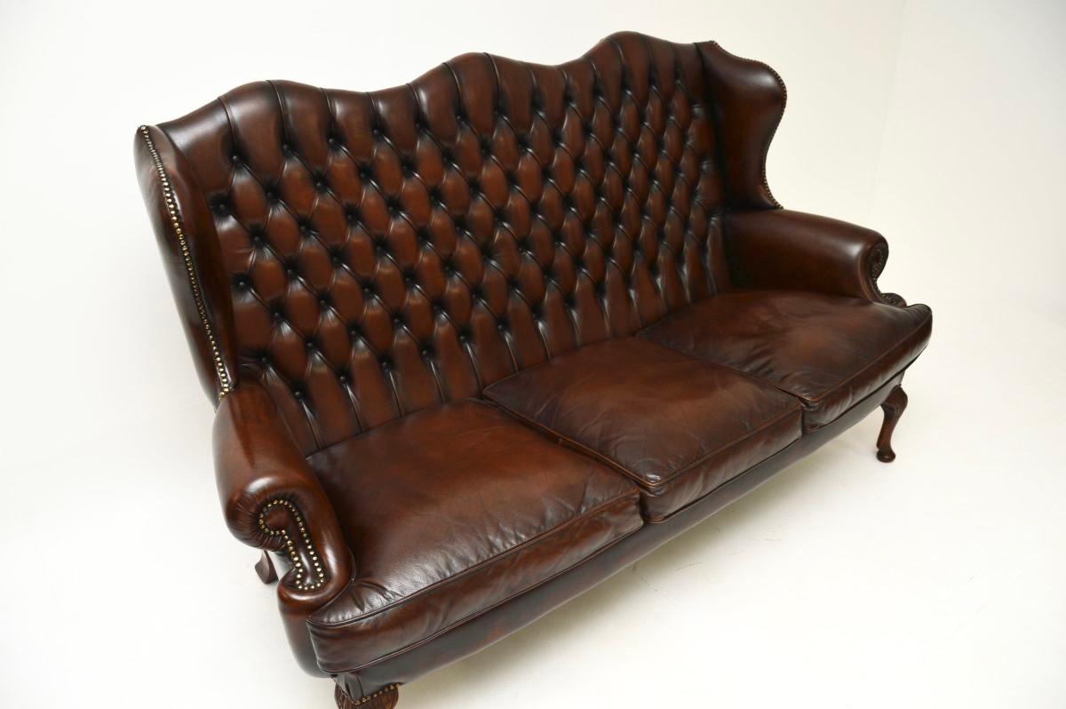 Antique Leather Wing Back Sofa For Sale 1