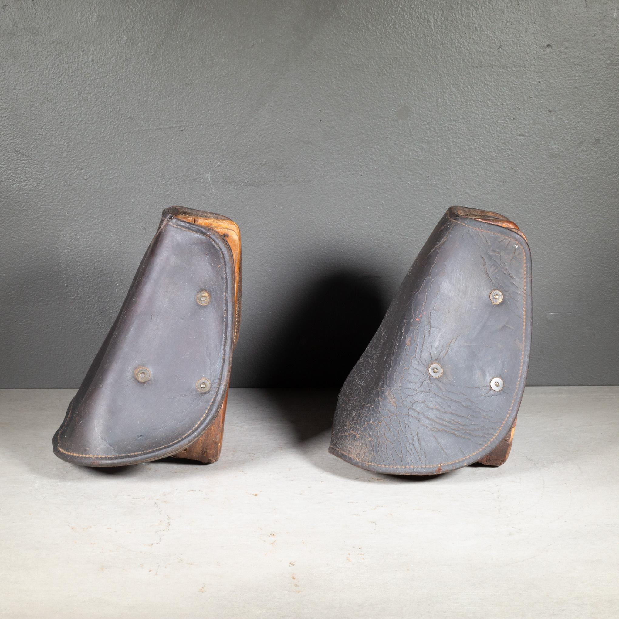 ABOUT

A pair of leather and wood World War 1, U.S. Military horse stirrups. Embossed on the front 