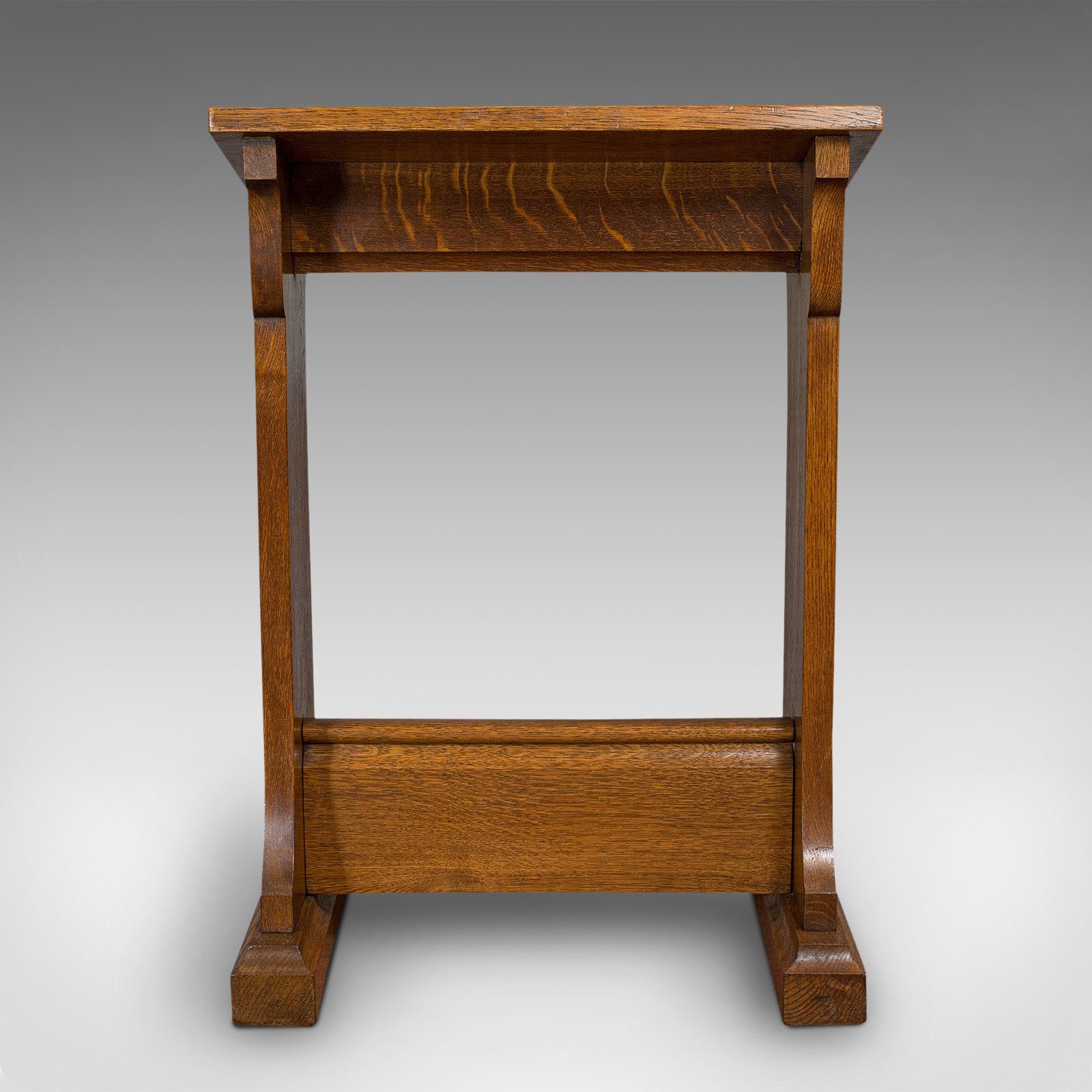 This is an antique lectern. An English, oak ecclesiastical book rest or prie dieu, dating to the late Victorian era, circa 1900.

Attractive rest with superb figuring
Displays a desirable aged patina
Quarter-cut oak resplendent with fine grain