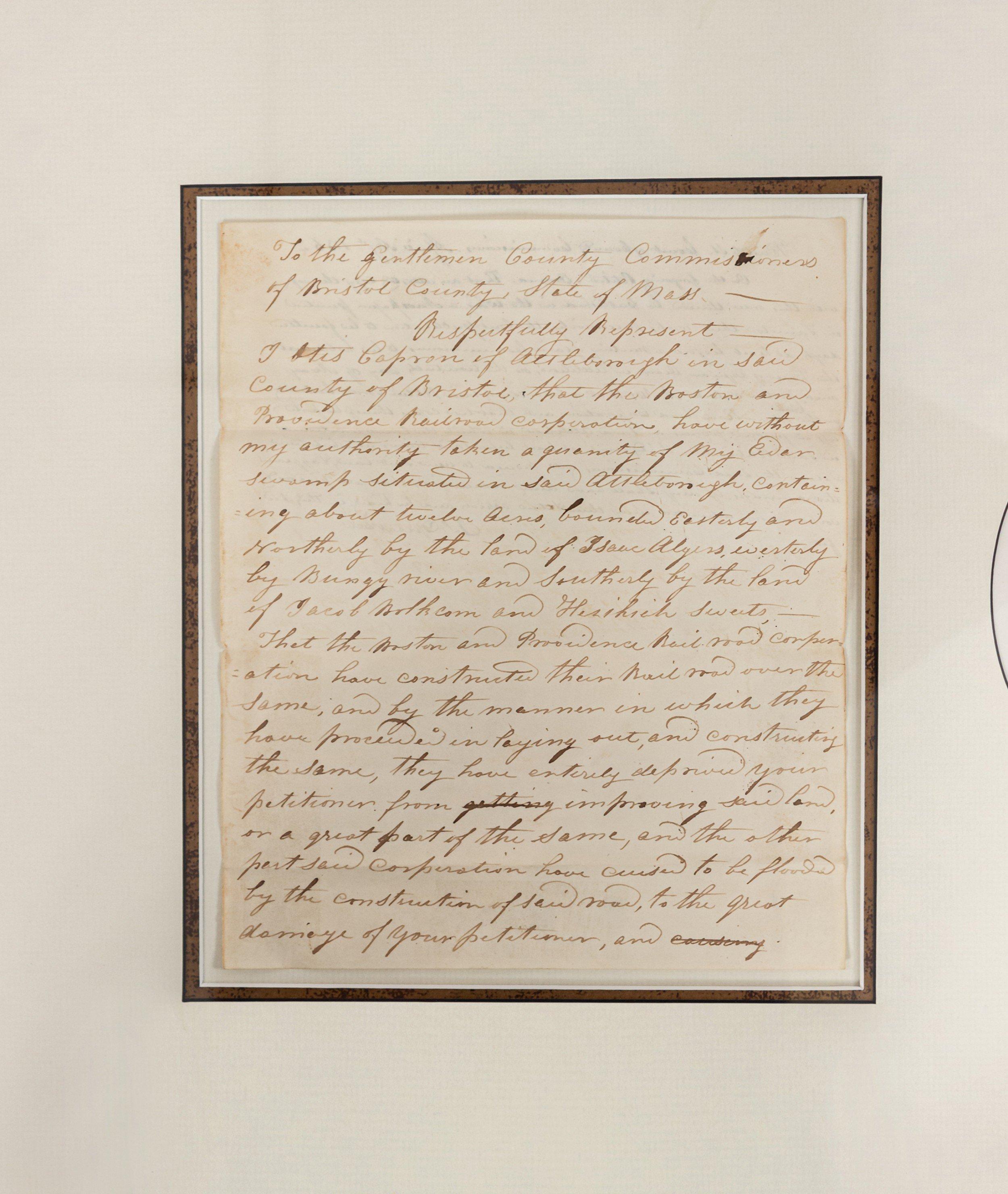 American (19th Century) copy collection of two letters from the 1830s in a white mat with a central oval printed portrait of a gentleman (Otis Cafron) in a gold wooden frame.
 