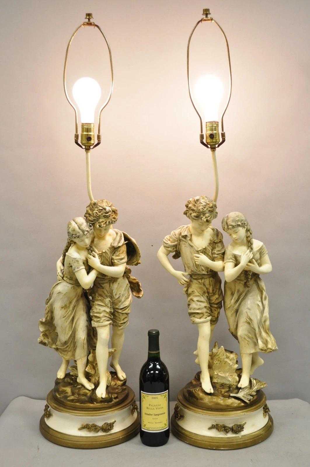 Antique L&F Moreau French Renaissance Large Figural Boy and Girl Table Lamps - a Pair. Circa all'inizio del XX secolo. Misure: 42