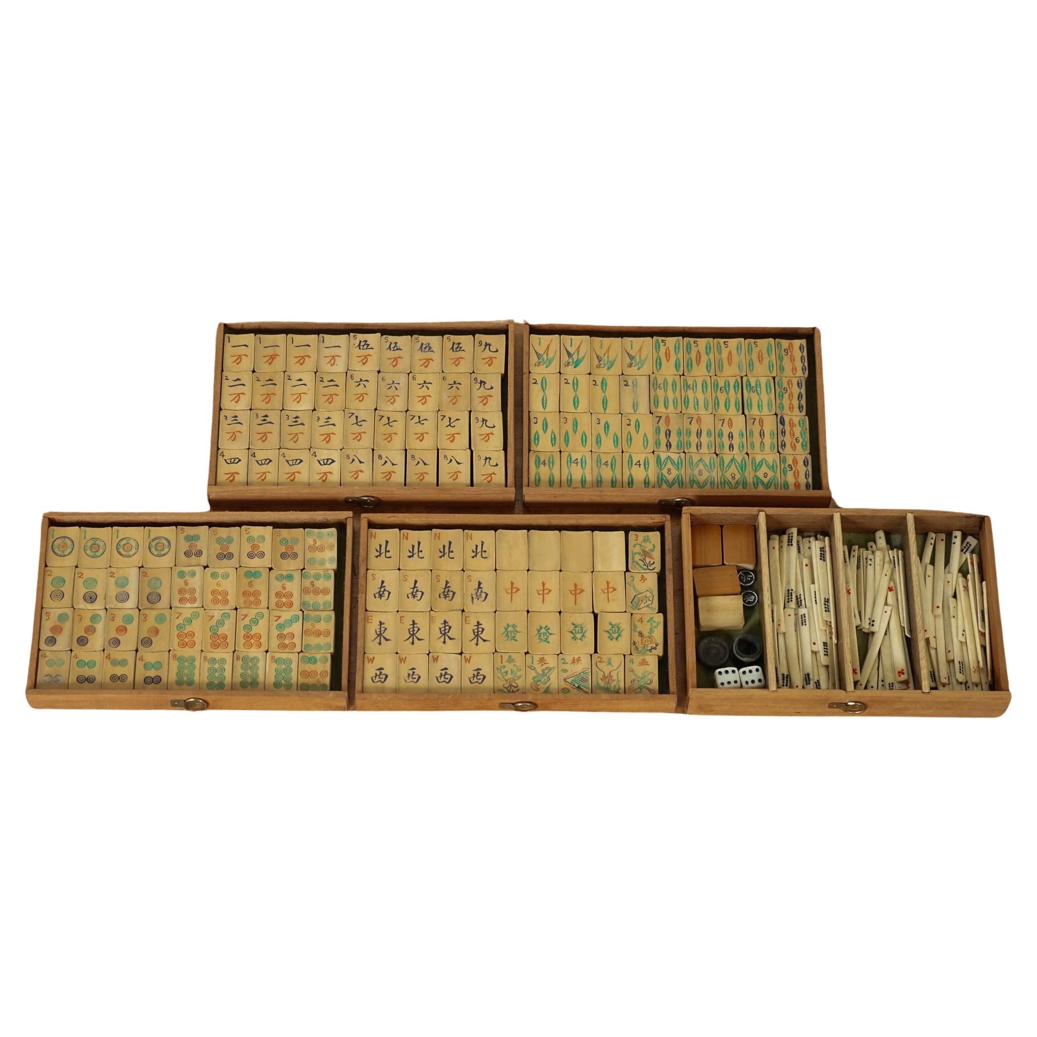 
We are delighted to offer for sale this exquisite Antique Chinese Mah-jong set, dating back to circa 1920s, is now available for purchase. It is a complete set, including the original counters, and comes in a case with a rare and stunning Art