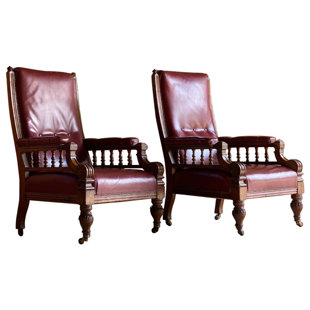 Pair of English antique oak and leather library armchairs, circa 1860

A very handsome pair of English antique Victorian oak and leather library armchairs circa 1860, the solid oak construction beautifully carved and decorated top quality burgundy