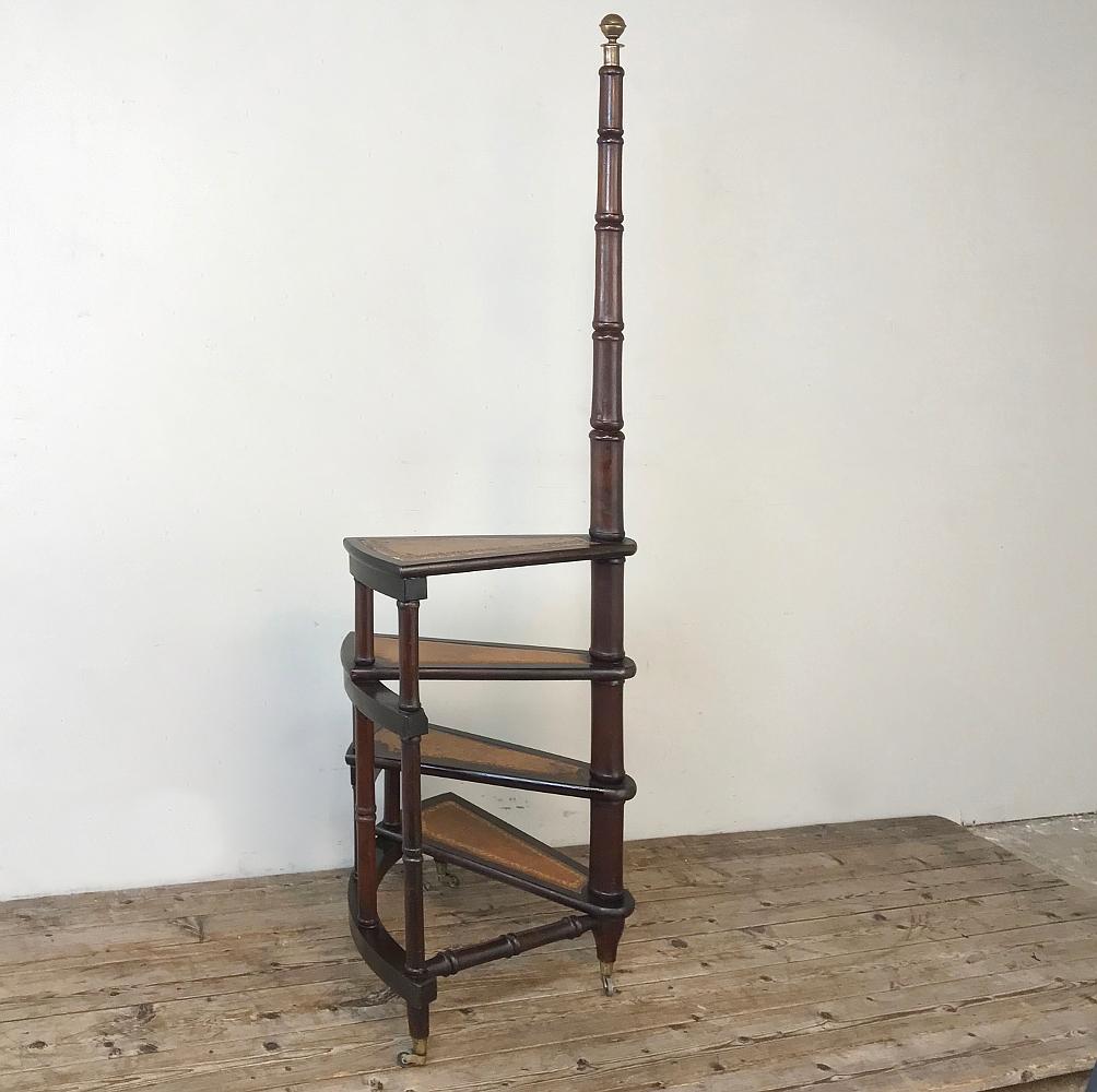 Antique library ladder is the perfect choice for reaching those upper shelves, whether it's in the library or any room! Leather lined treads add a sensible luxurious touch,

circa early 1900s

Measures 62H x 19W x 25D.