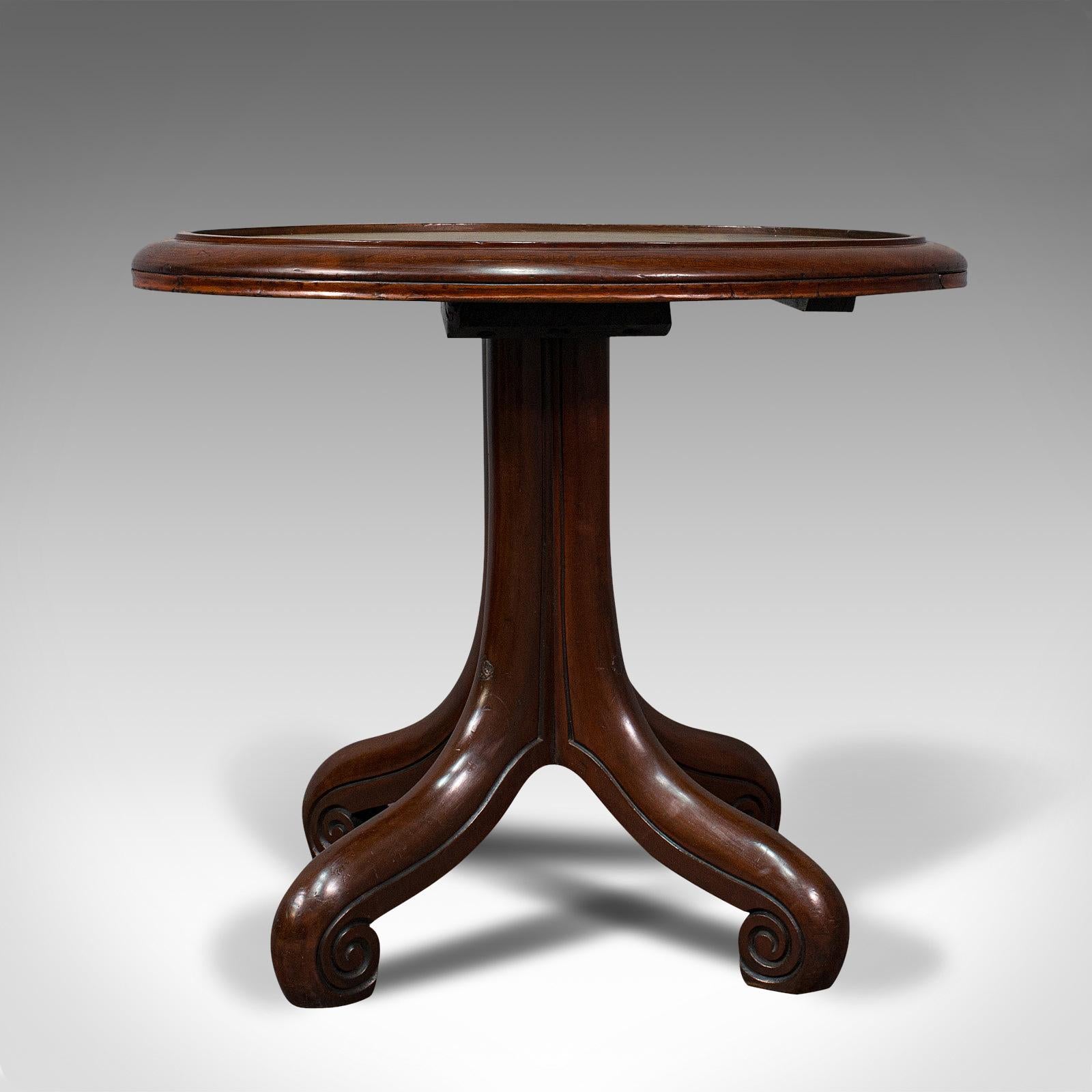 This is an antique library side table. An English, mahogany and leather oval occasional table with slide, dating to the early Victorian period, circa 1850.

Attractive side table dressed with a quality leather top
Displays a desirable aged patina