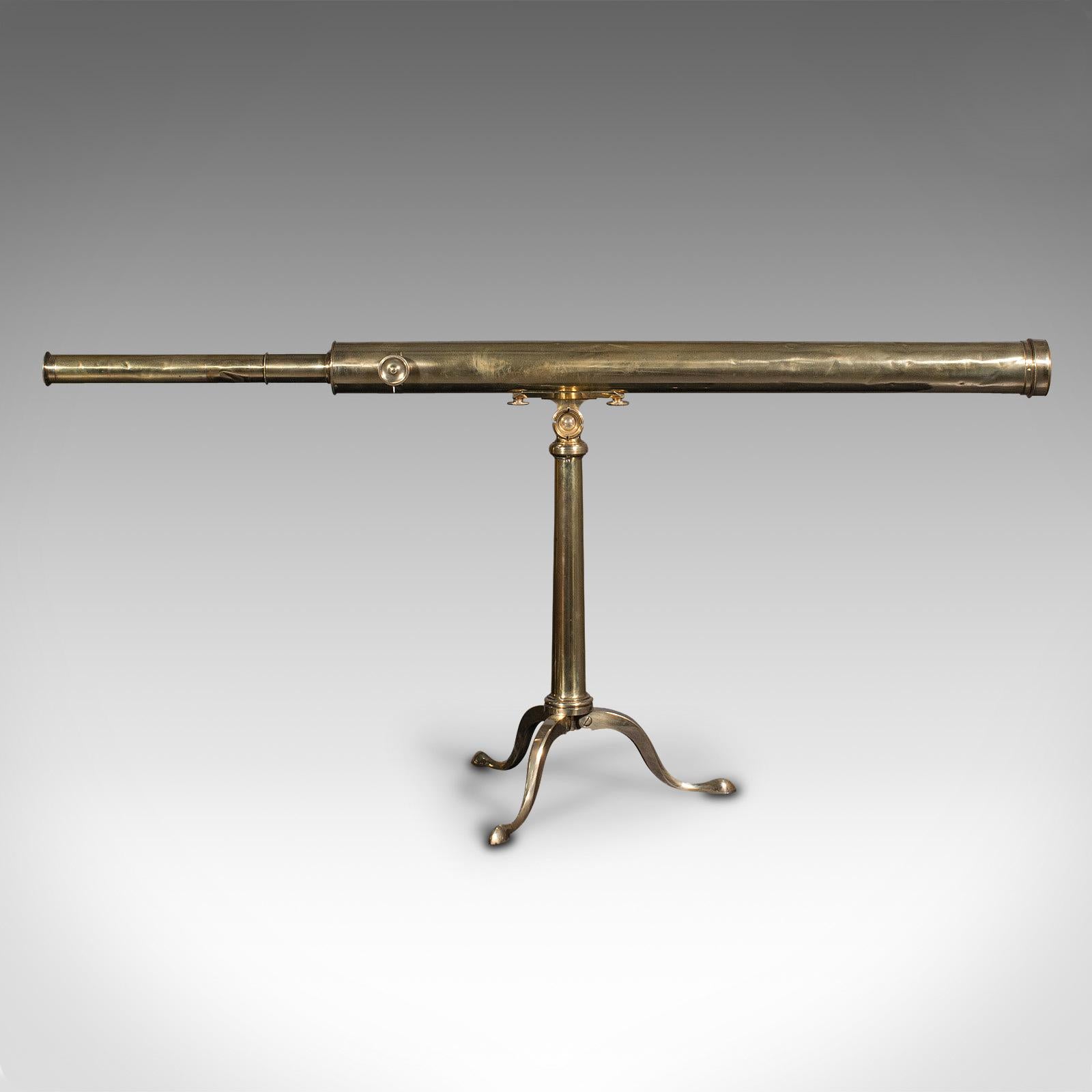 This is an antique library telescope. An English, brass astronomical mounted refractor by Dollond of London, dating to Victorian period, circa 1890.

Perfect for bird watching, landscape appreciation, wildlife stalking, or maritime observation.